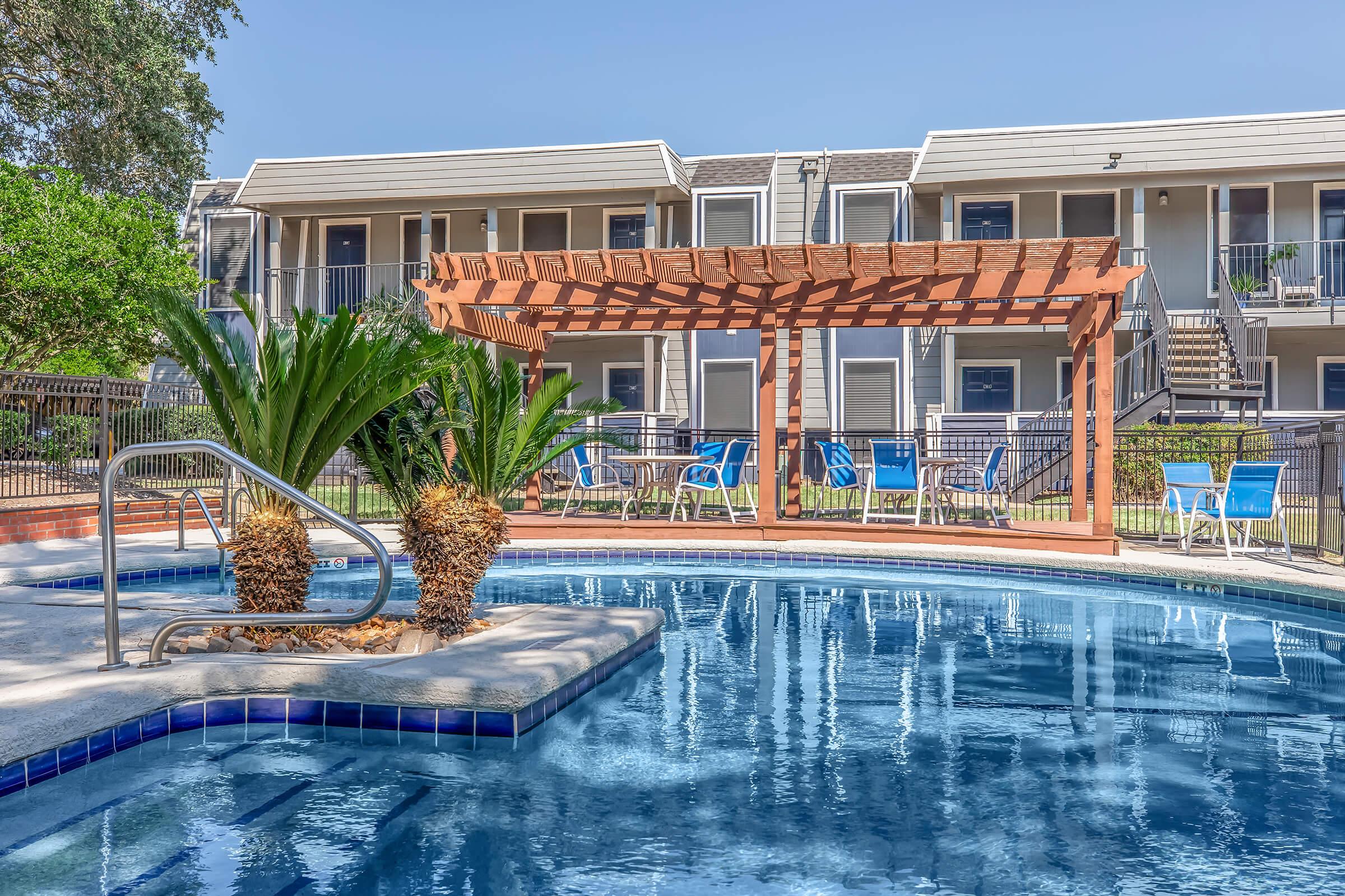 a large pool of water in front of a building