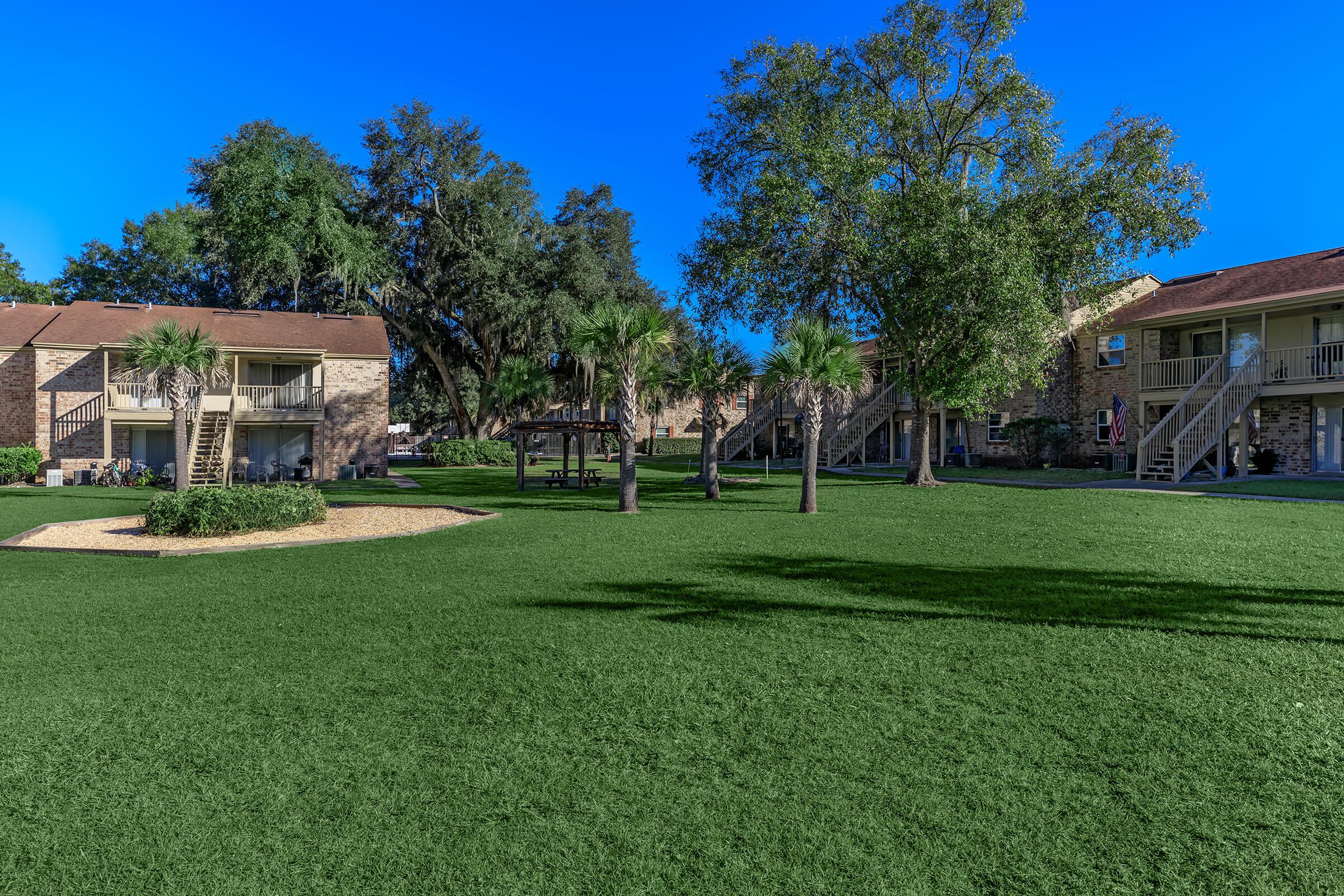a large lawn in front of a house