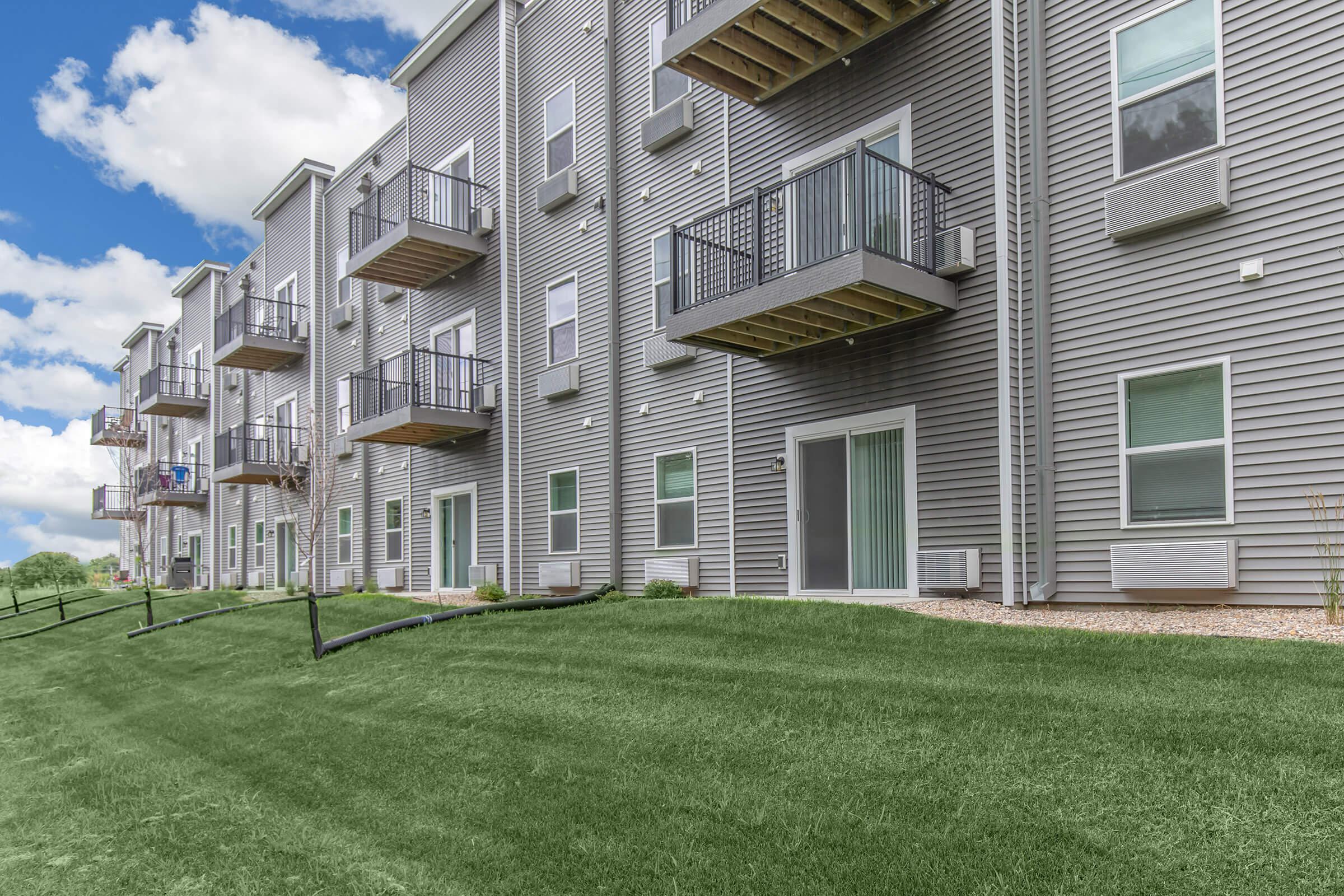 a large lawn in front of a building