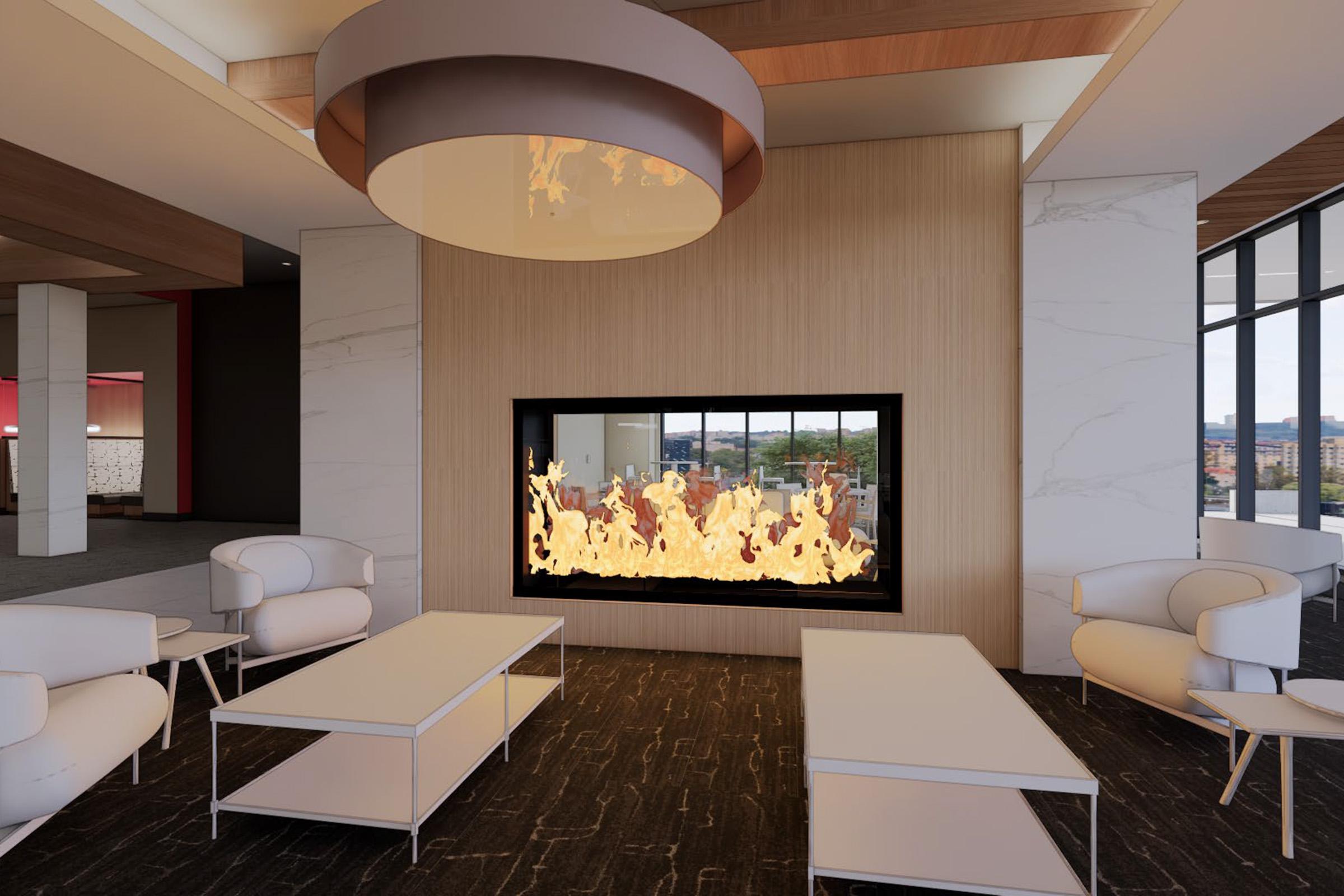 A modern lounge area featuring a contemporary fireplace with visible flames. The space includes minimalistic white chairs and coffee tables, set against a stylish backdrop of wood and stone. Large windows allow natural light to enter, showcasing an outdoor view.