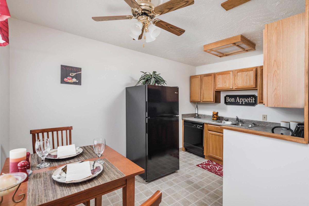 a kitchen with a dining room table