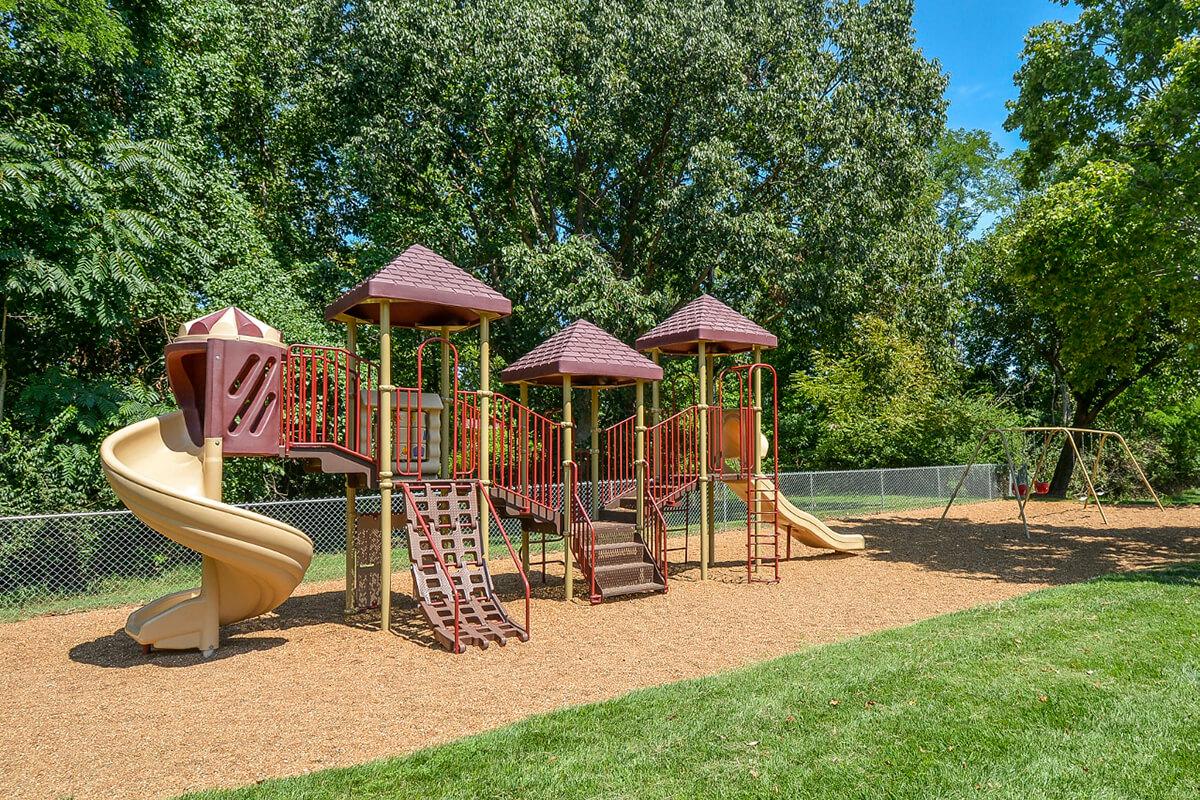 Orchard Village Apartments in Manchester, MO - Playground 02.jpg