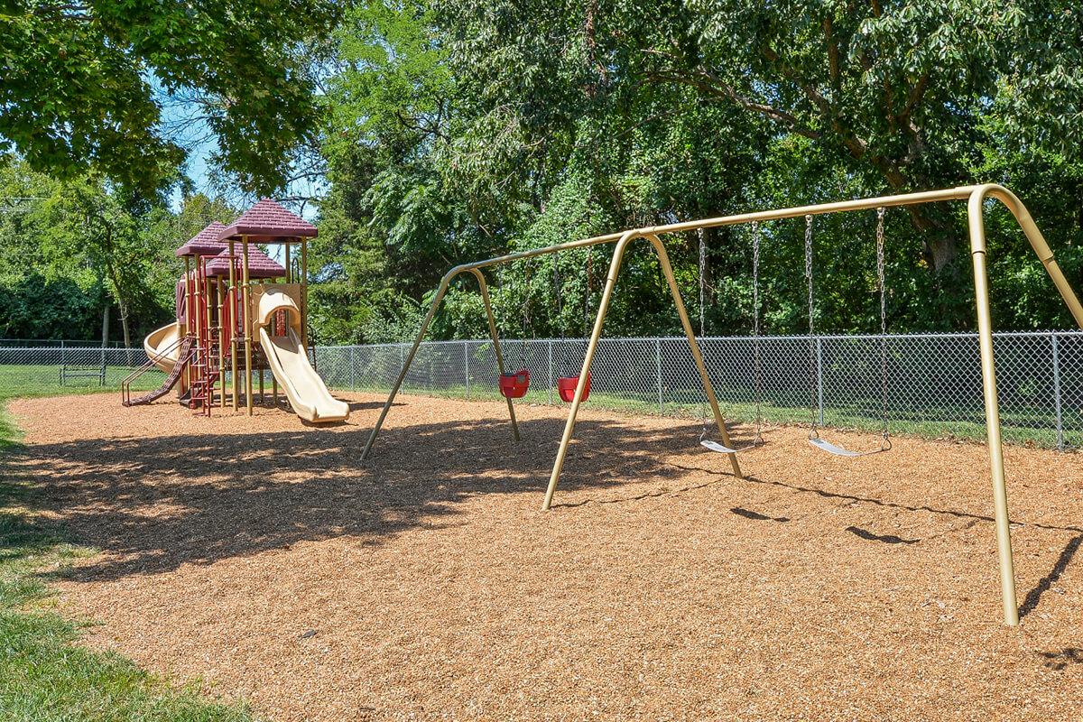 Orchard Village Apartments in Manchester, MO - Playground 04.jpg