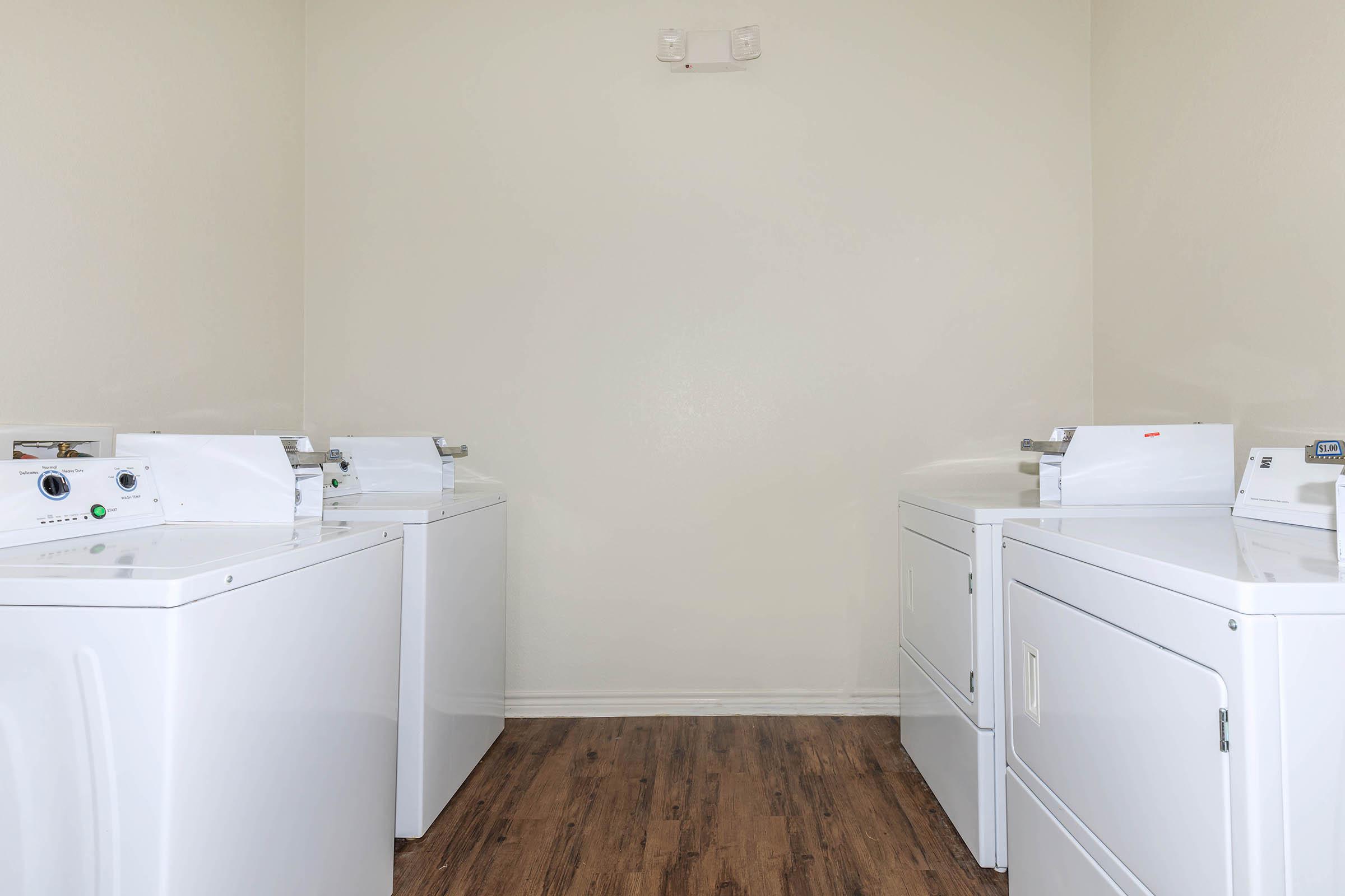 a white tub sitting next to a sink