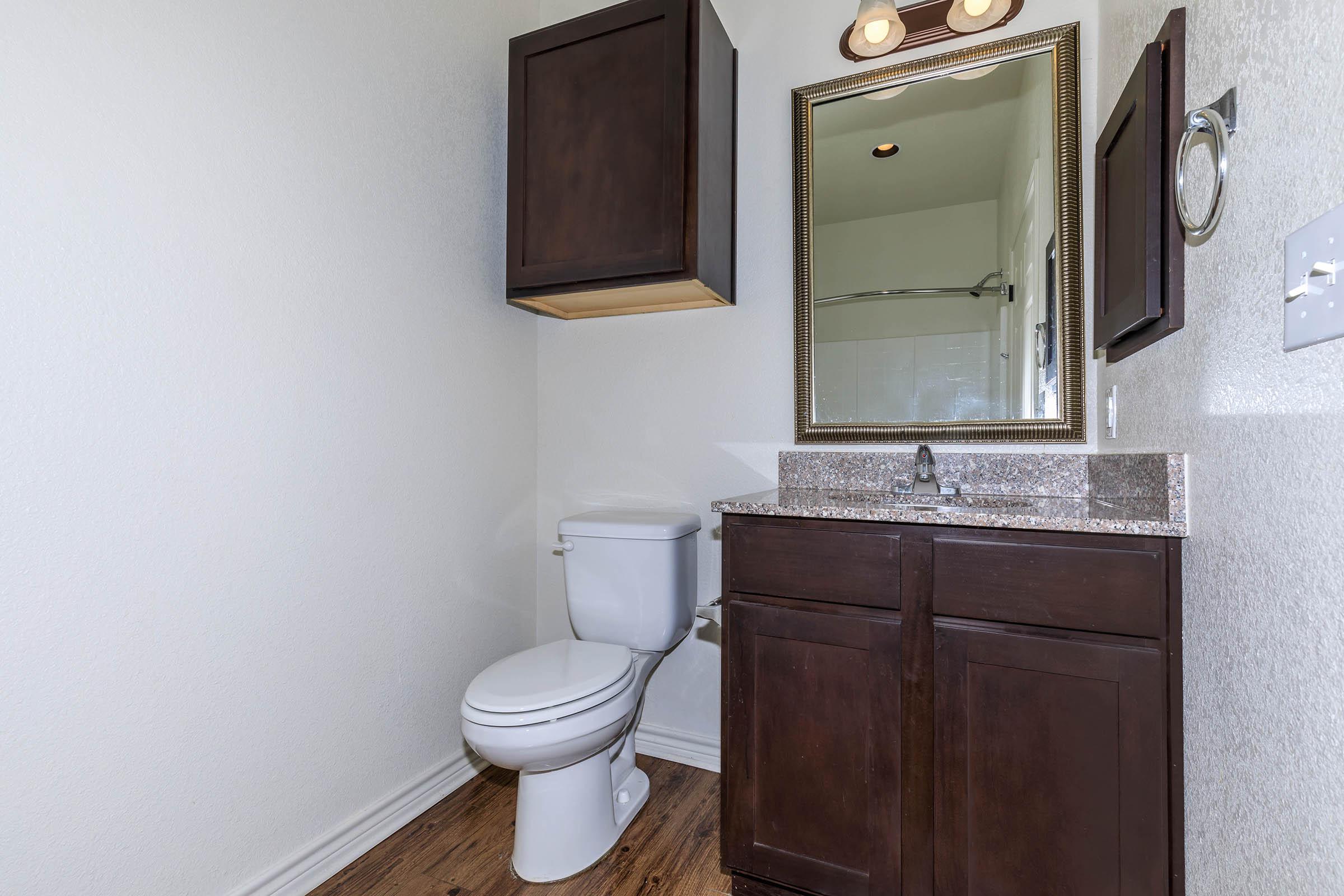 a white sink sitting next to a door