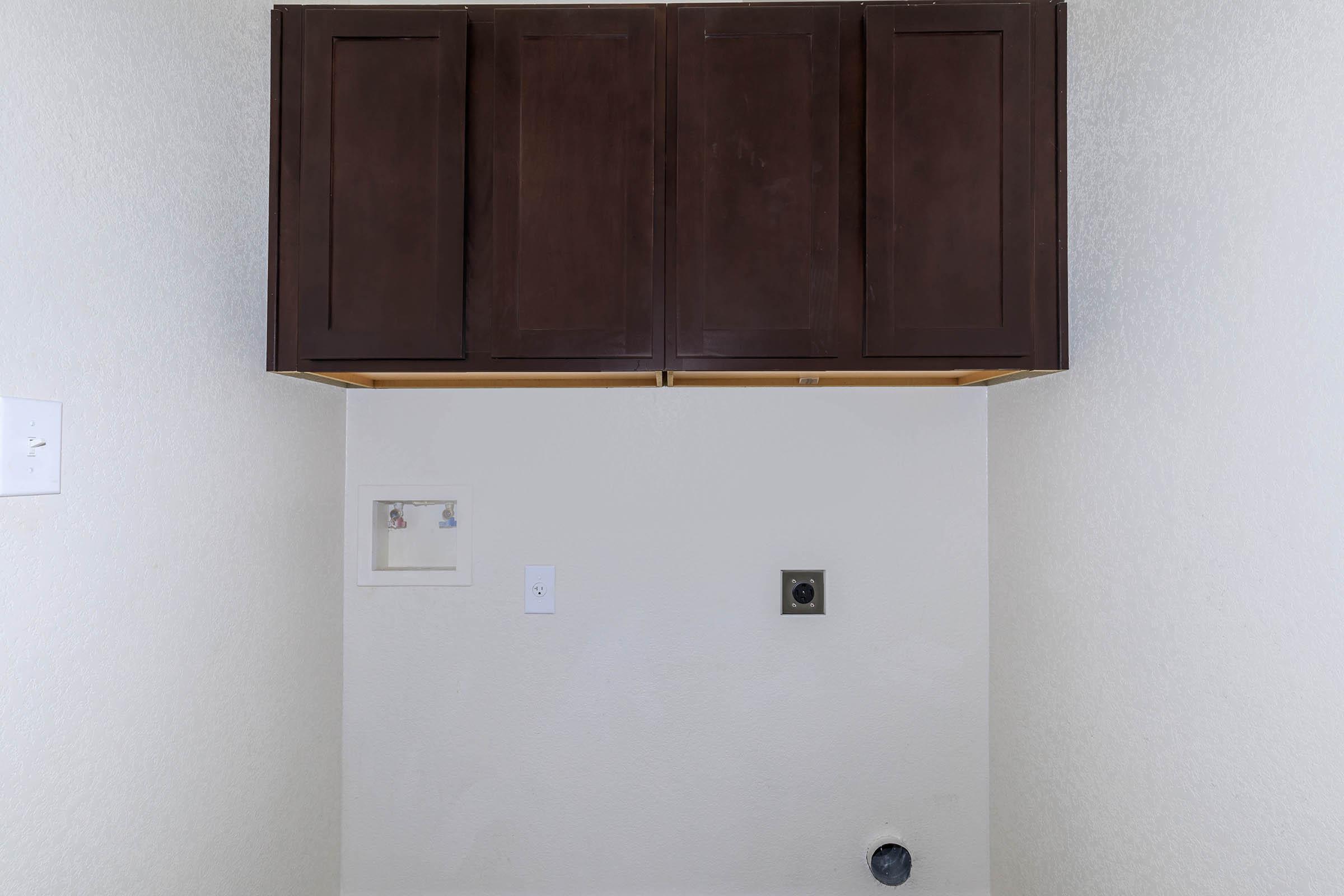 a white refrigerator freezer sitting inside of a kitchen