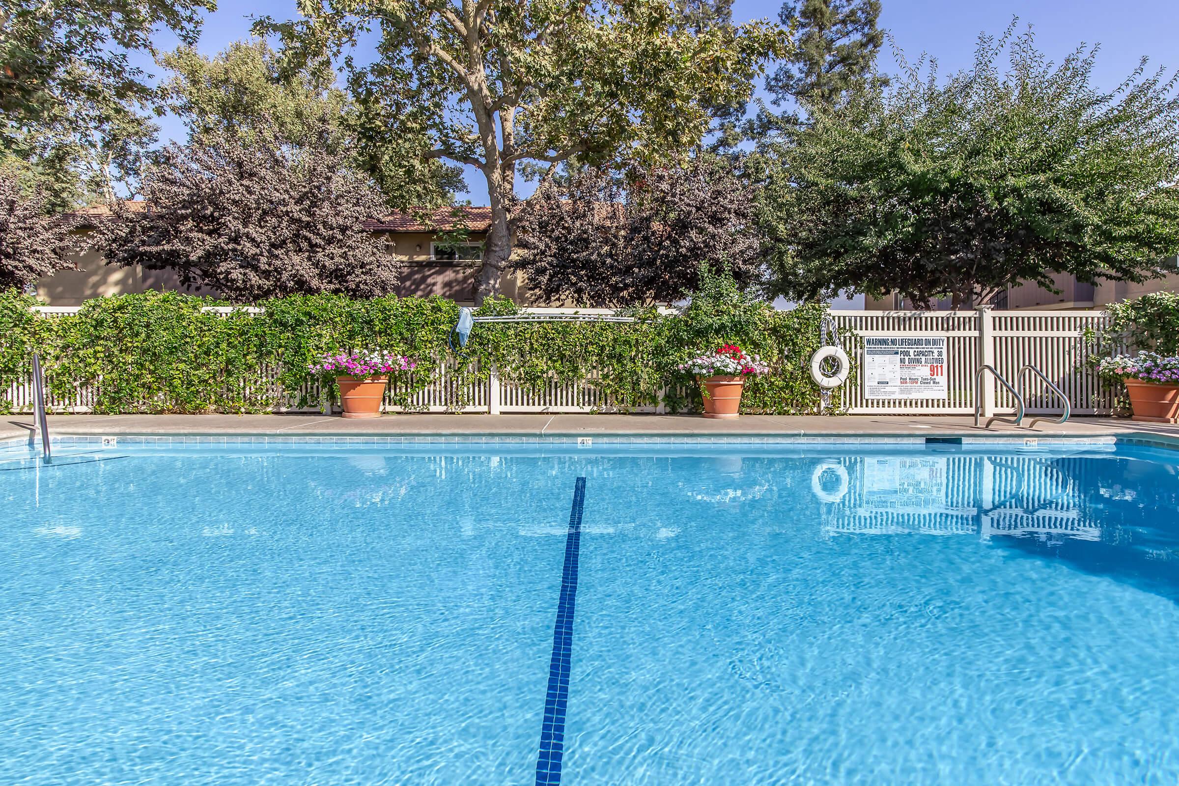 a pool next to a body of water