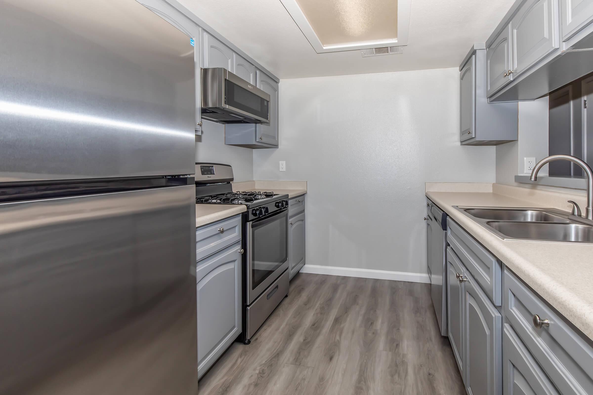 a kitchen with stainless steel appliances