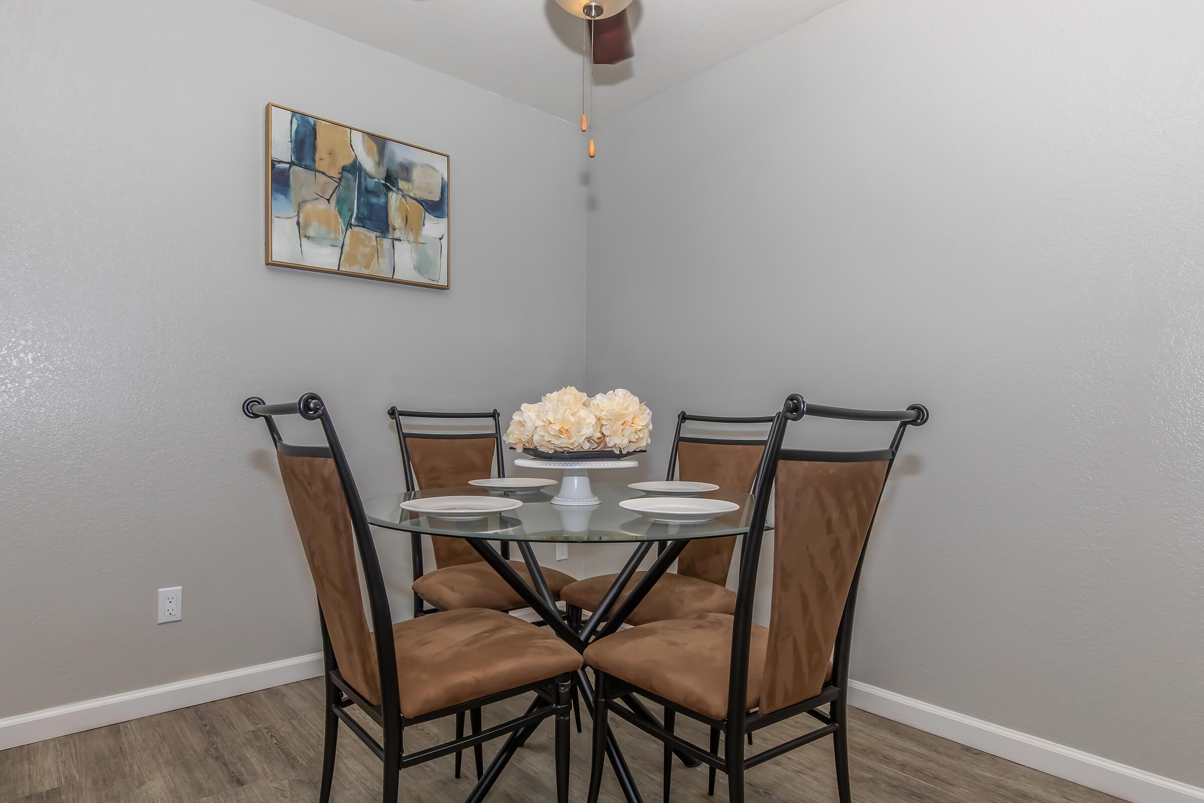 a chair sitting in front of a table