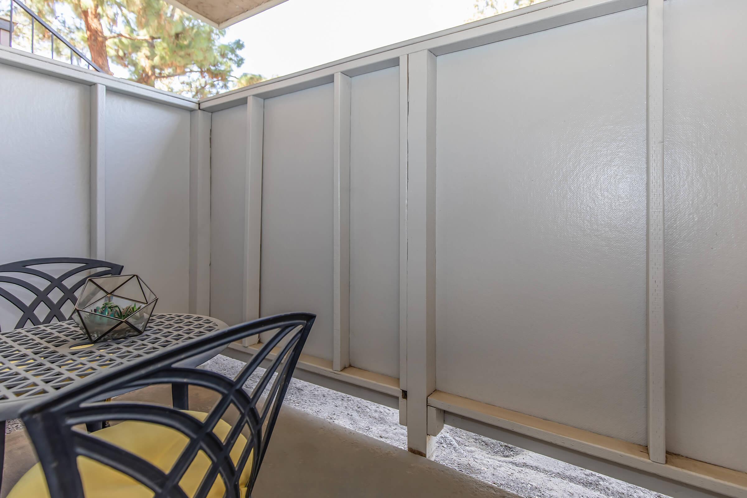 a chair sitting in front of a door