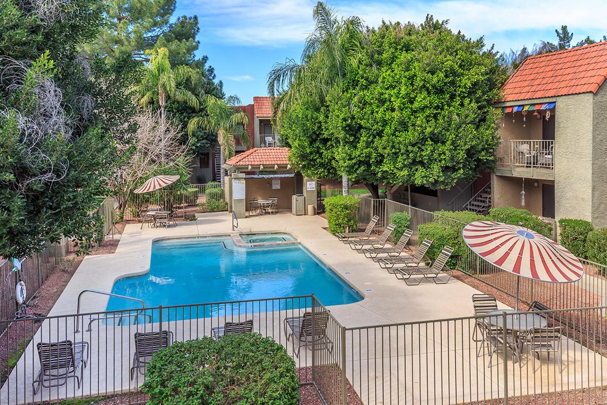 a house with a pool table in a garden