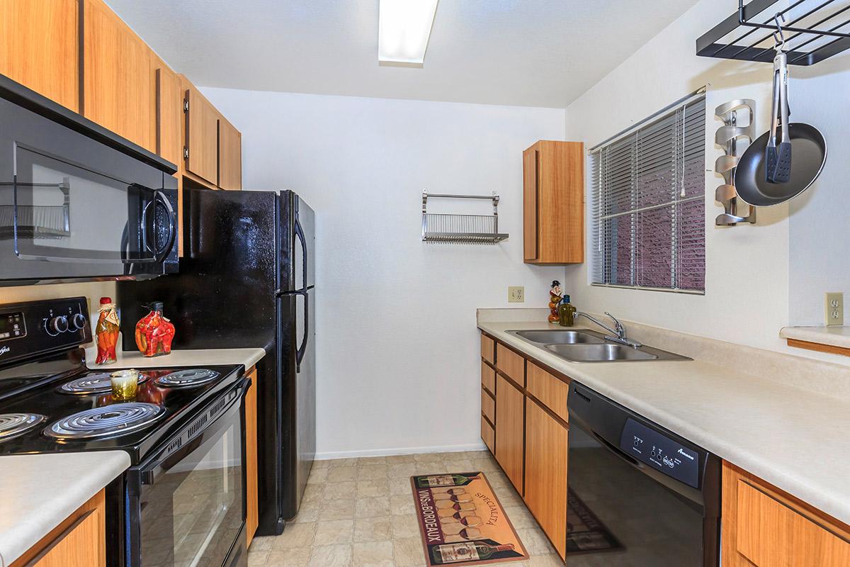 a modern kitchen with stainless steel appliances