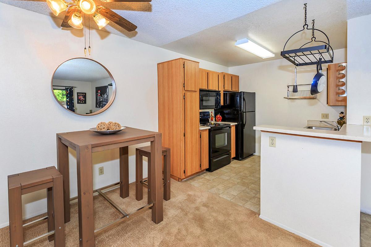 a kitchen with a table in a room