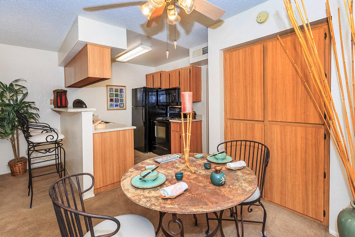 a kitchen with a dining room table