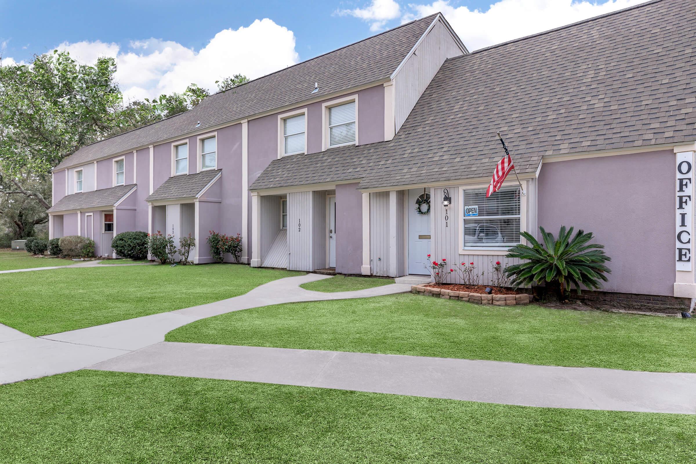 a large lawn in front of a house