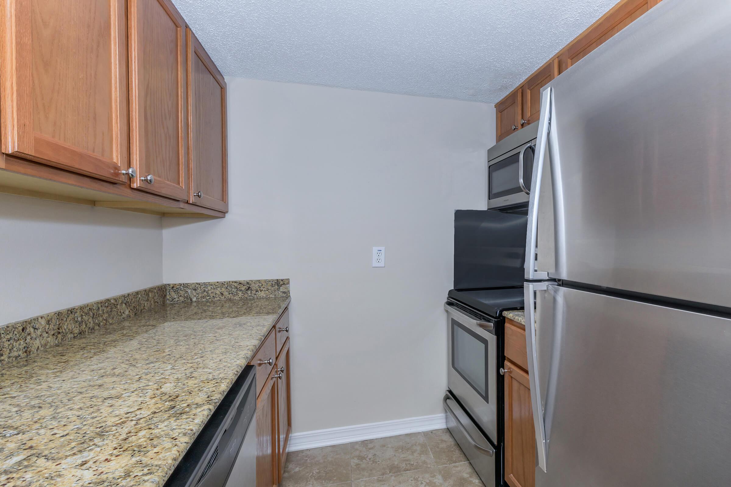 a stainless steel refrigerator in a kitchen