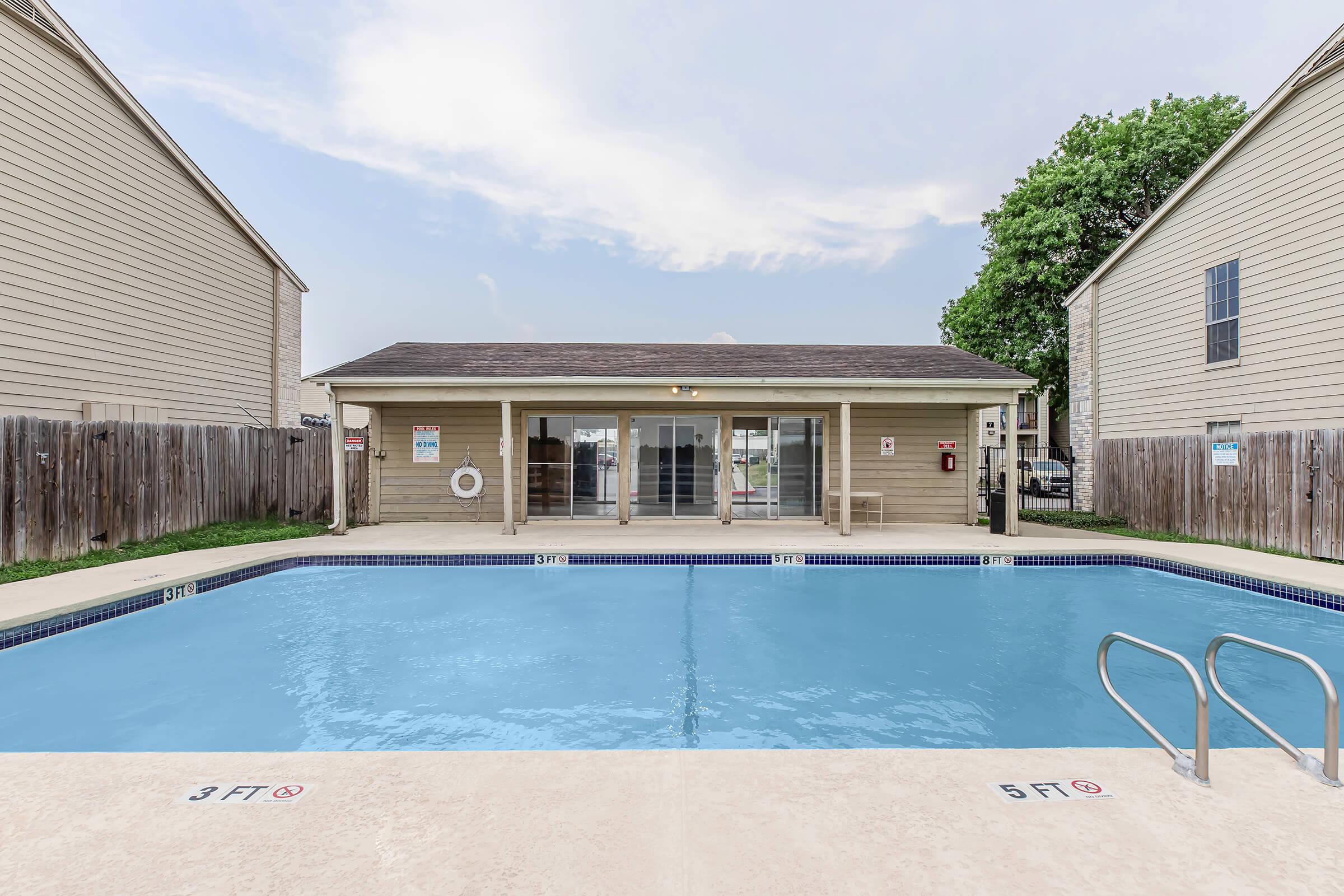 a pool next to a building