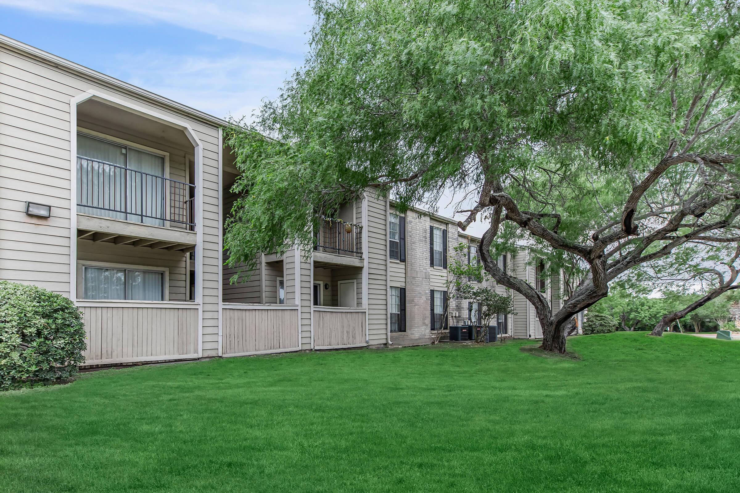 a large lawn in front of a house