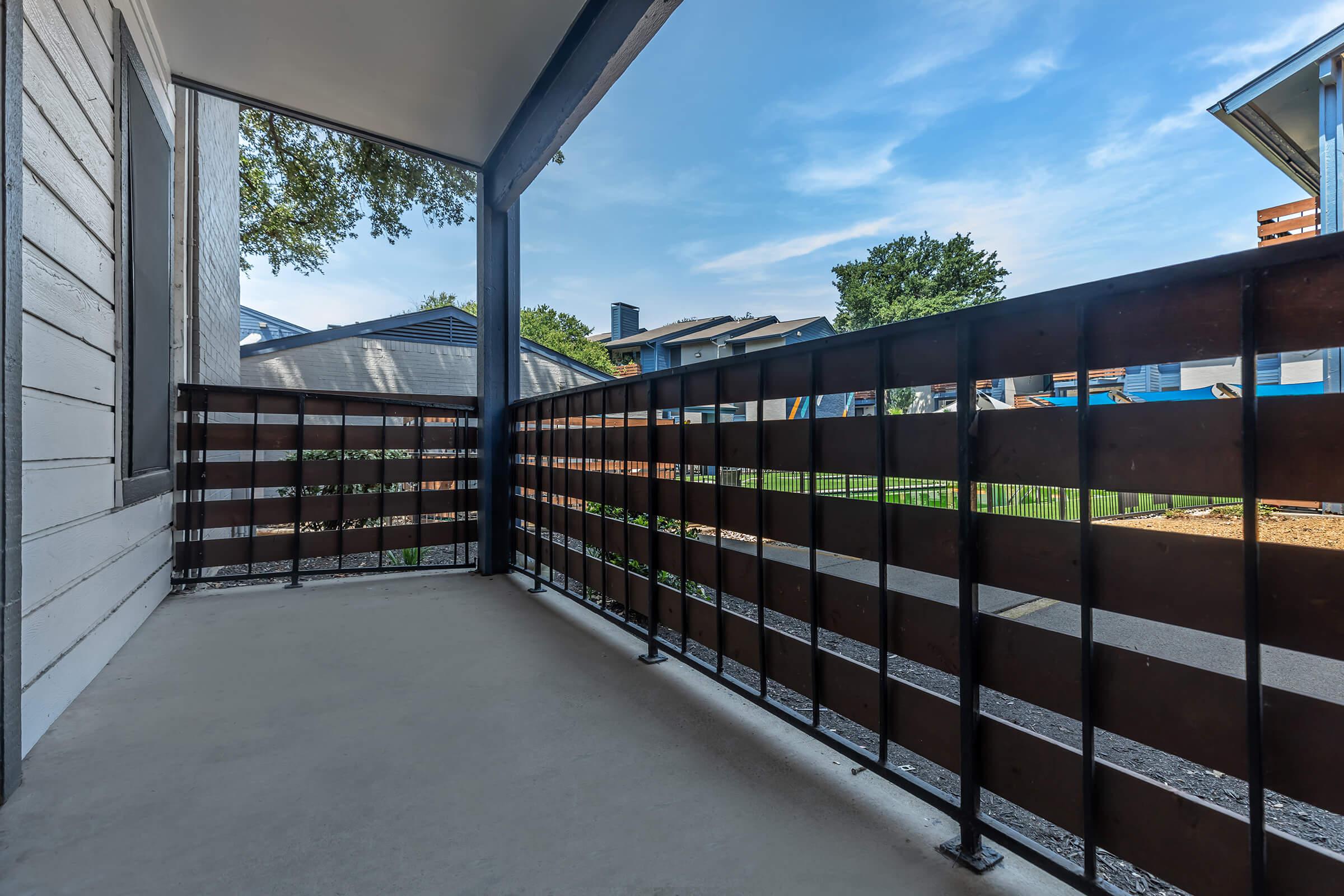 a building next to a fence