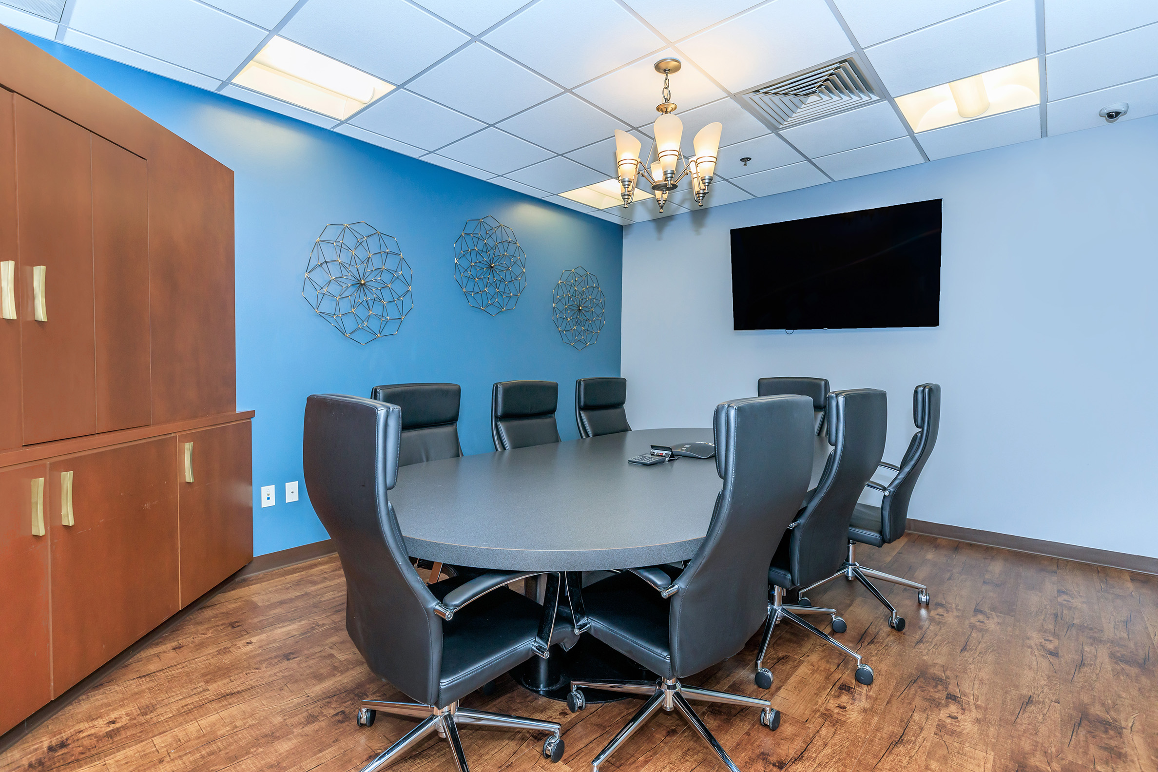 a blue chair in a room