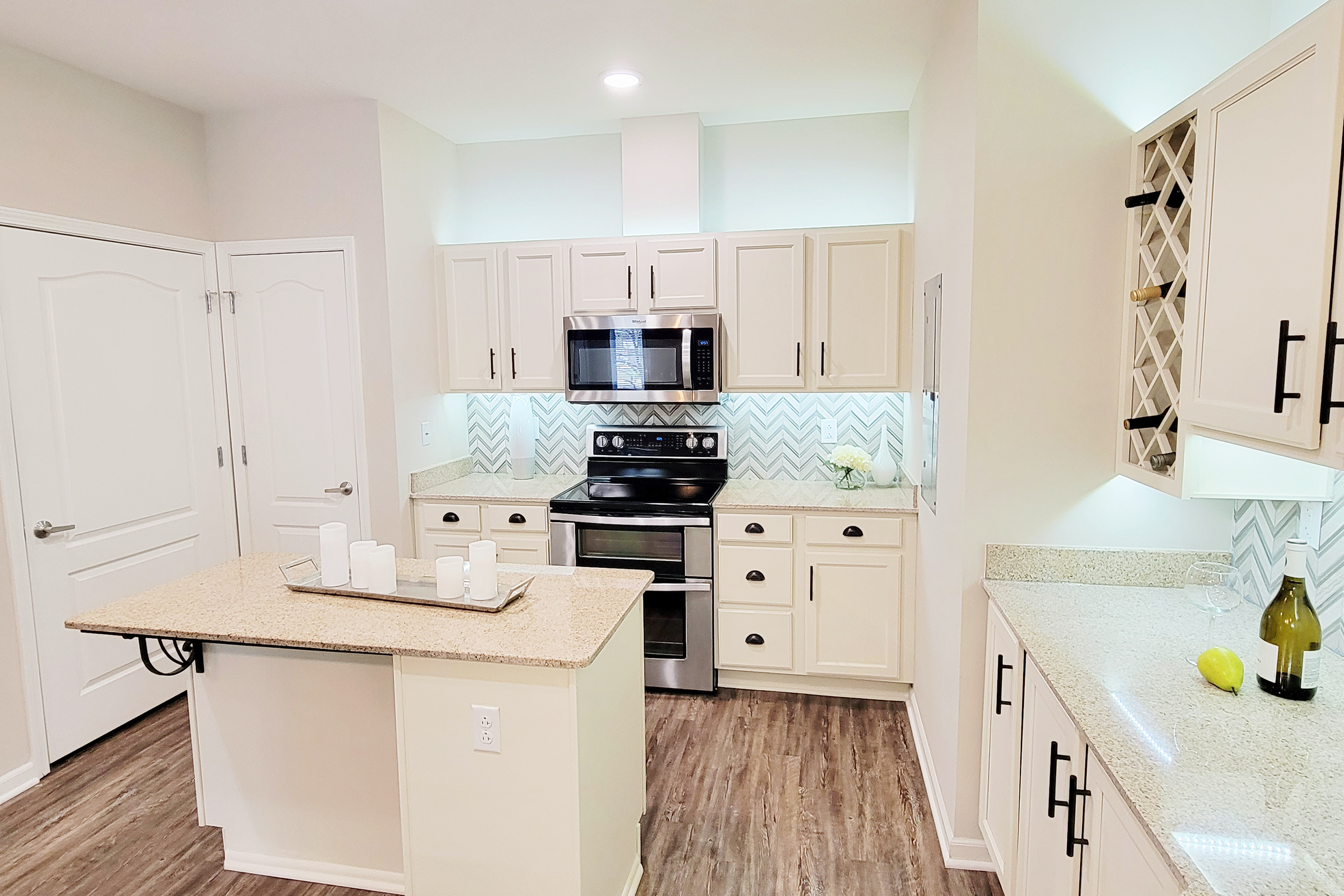 a kitchen with wooden cabinets