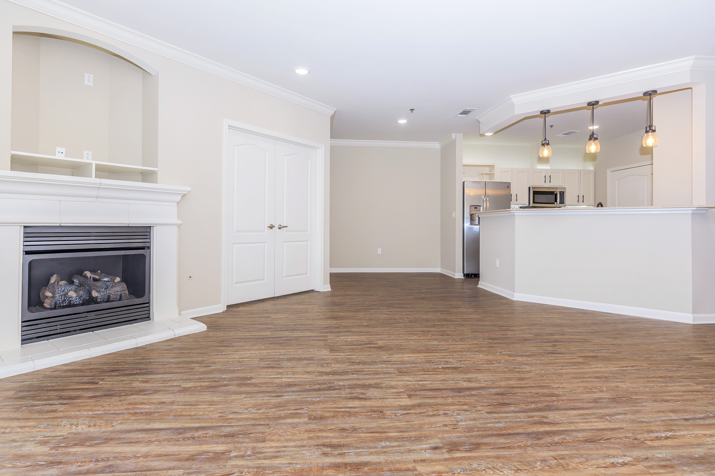 a room filled with furniture and a fireplace