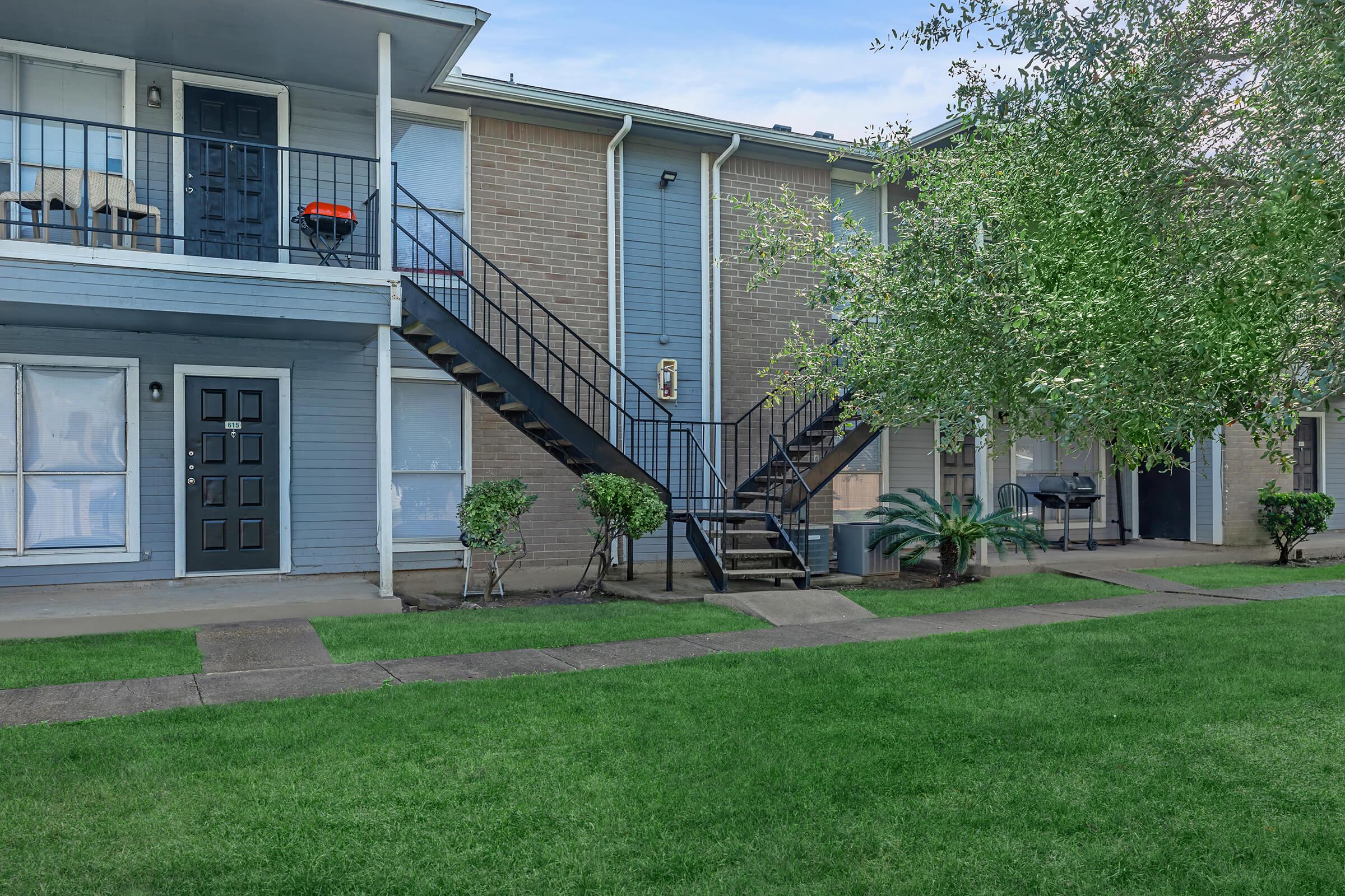 a large lawn in front of a building