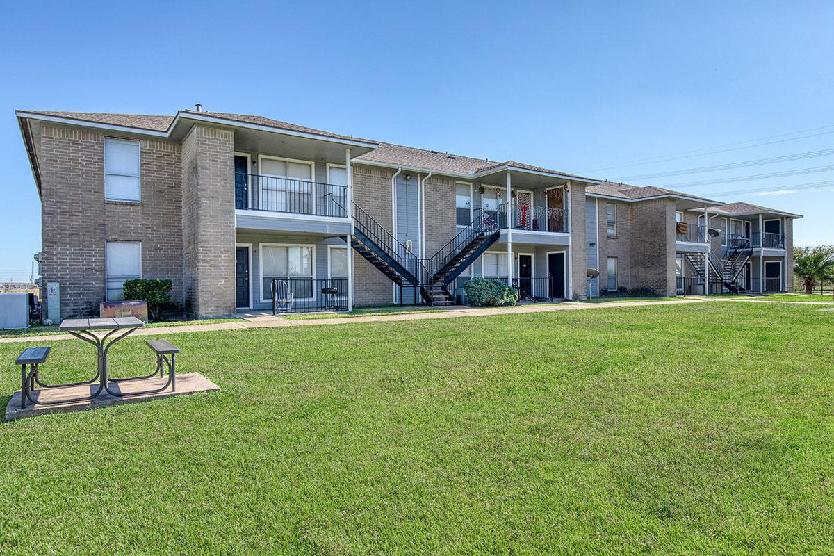 a large lawn in front of a house