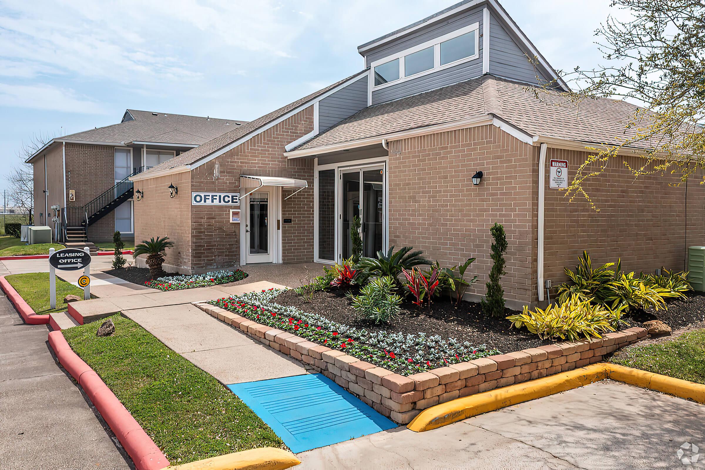 a garden in front of a building