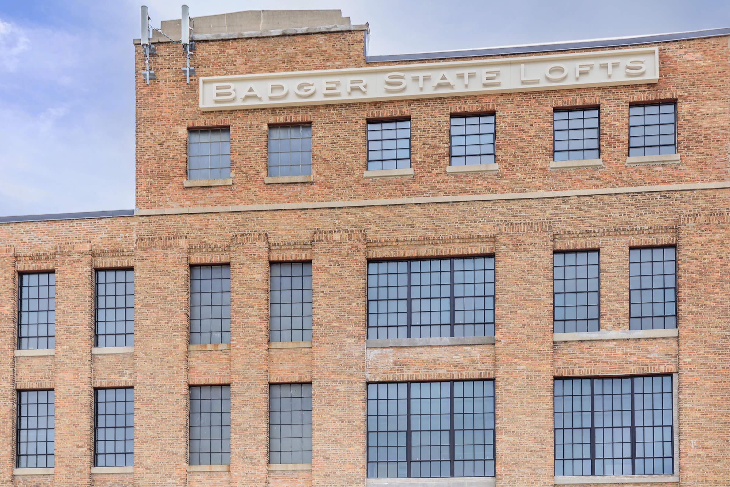 a tall brown brick building