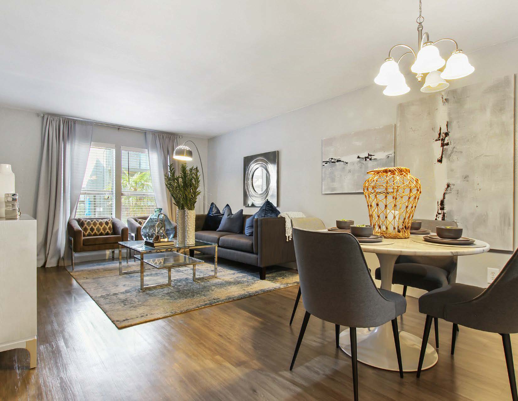 a living room filled with furniture and a fireplace