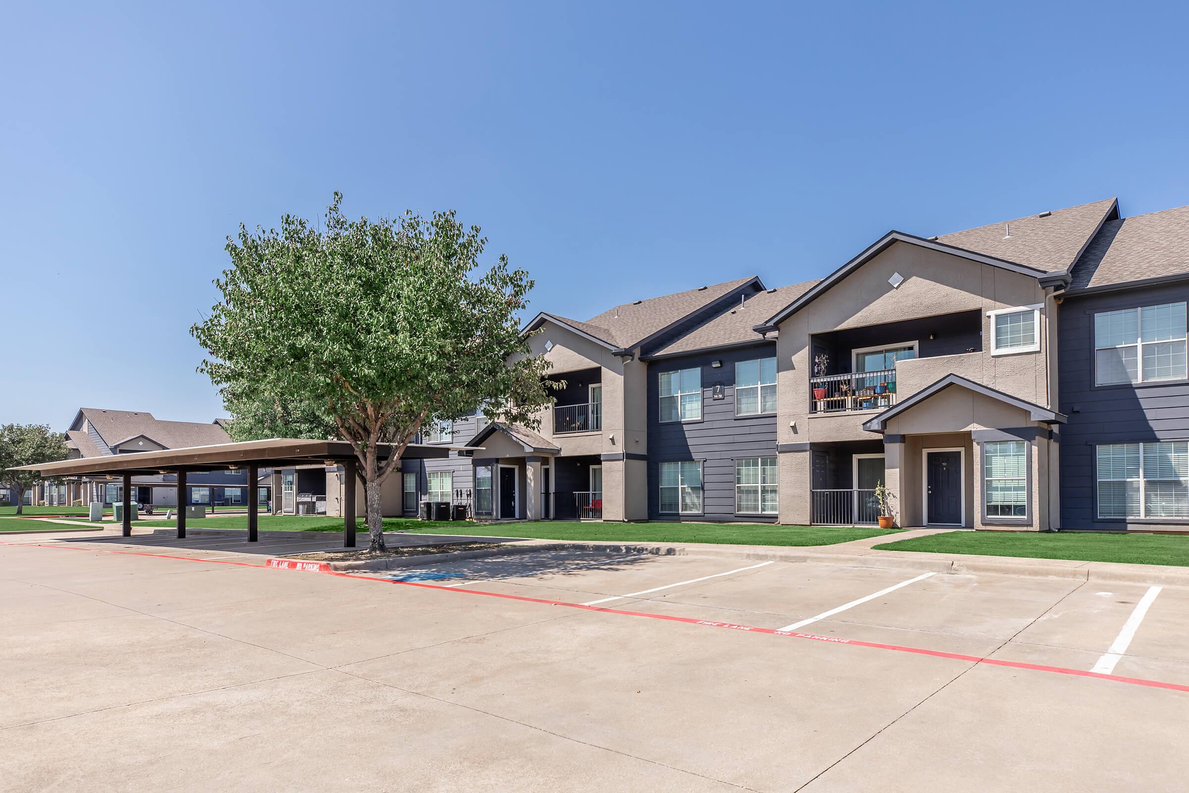 a small house in a parking lot