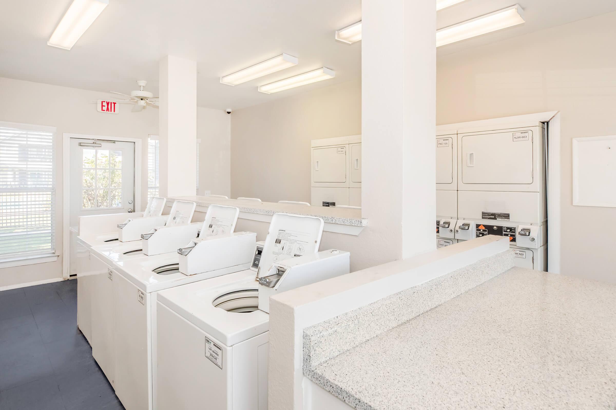 a kitchen with a sink and a window