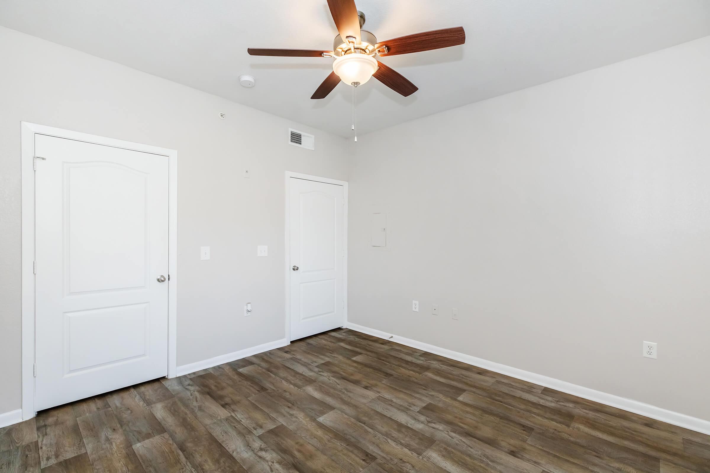 a kitchen with a wood floor