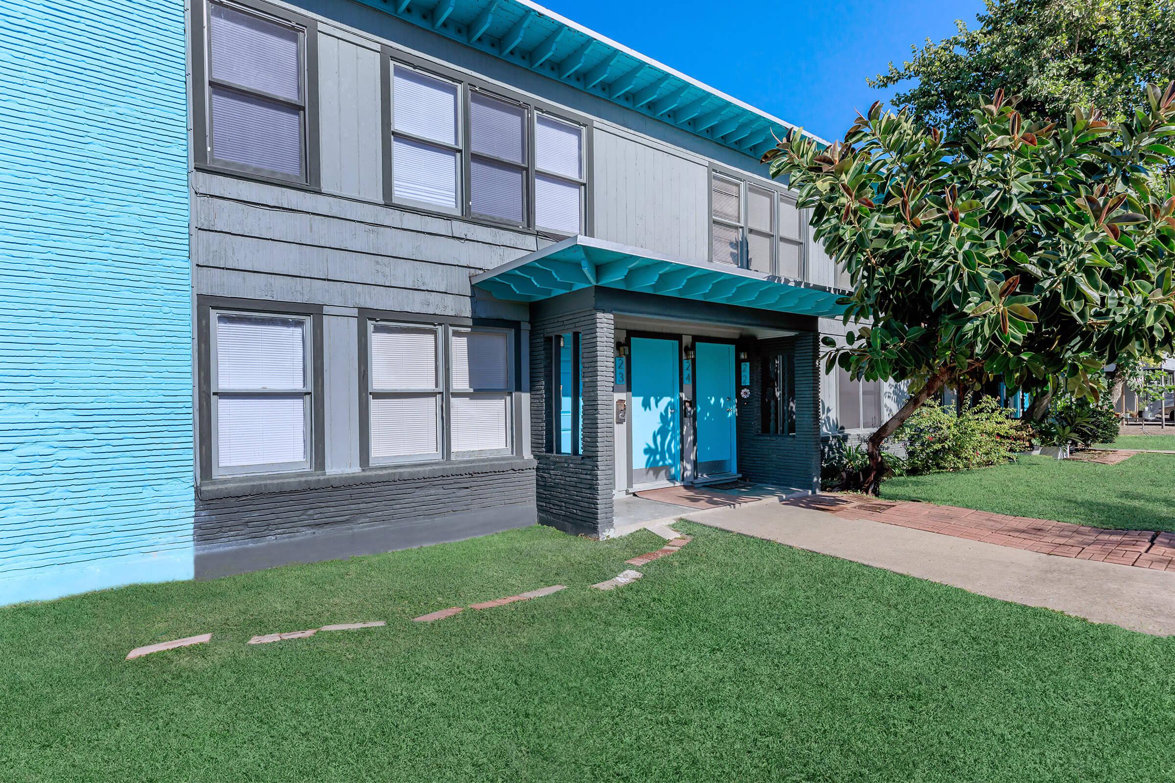 a large lawn in front of a building