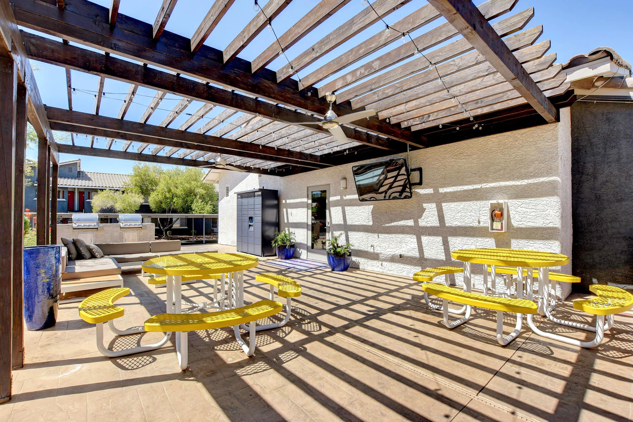 Outdoor Dining Area with TV at Sunset Hills, Henderson, Nevada