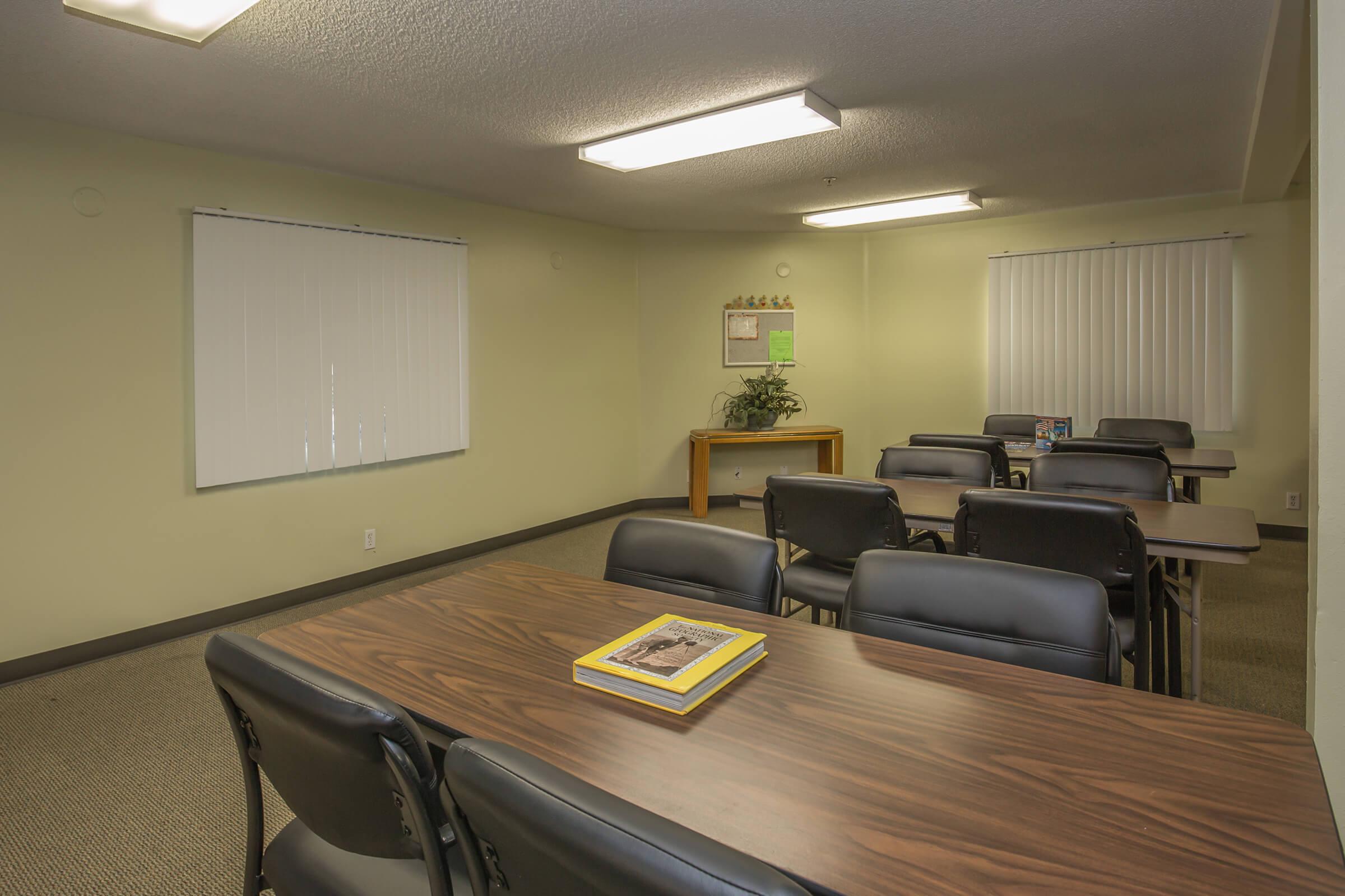 Community room with tables and chairs