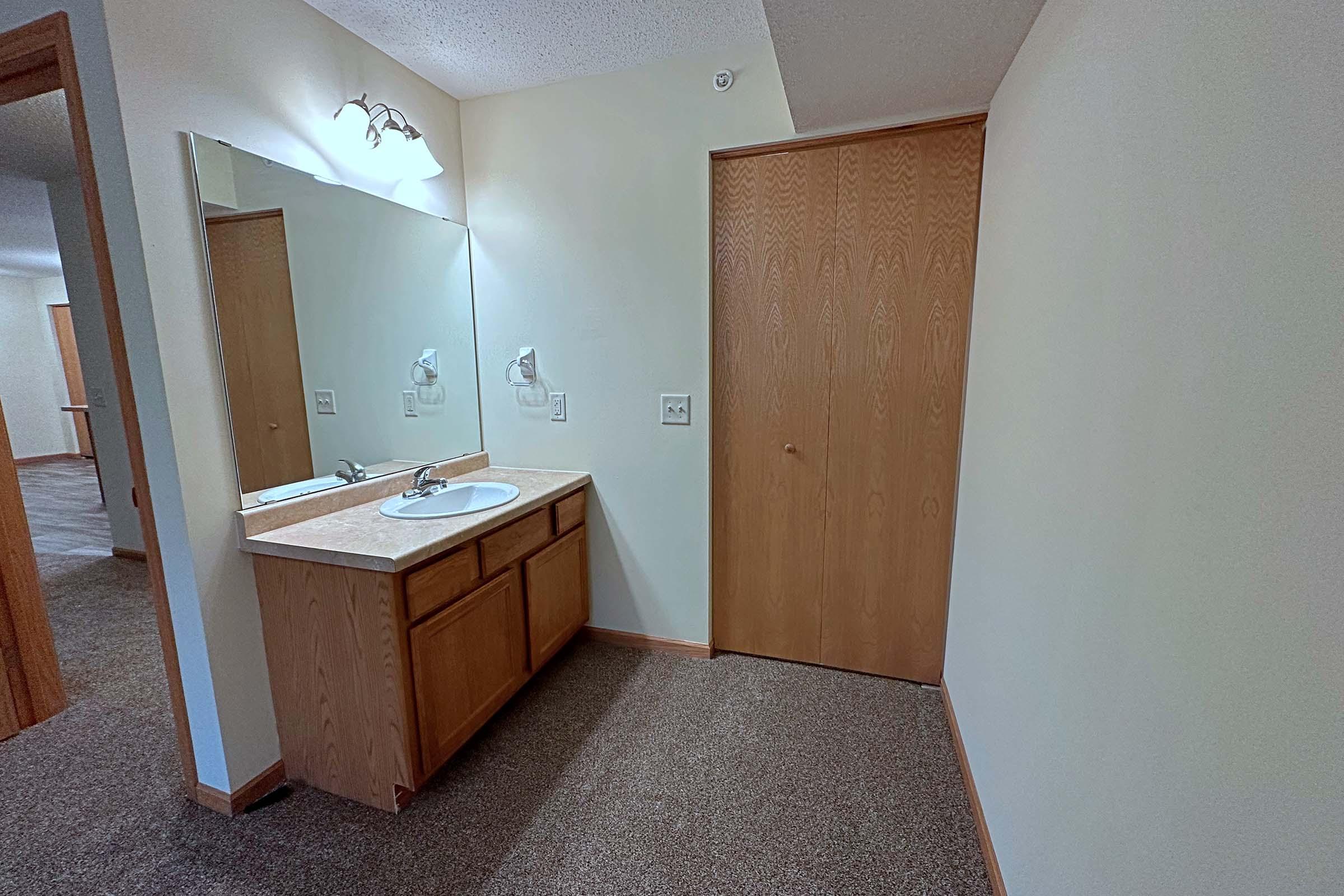 a bedroom with a wooden door