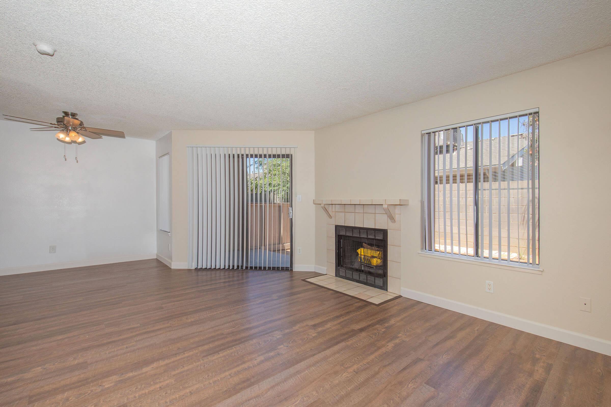 a living room with a wood floor