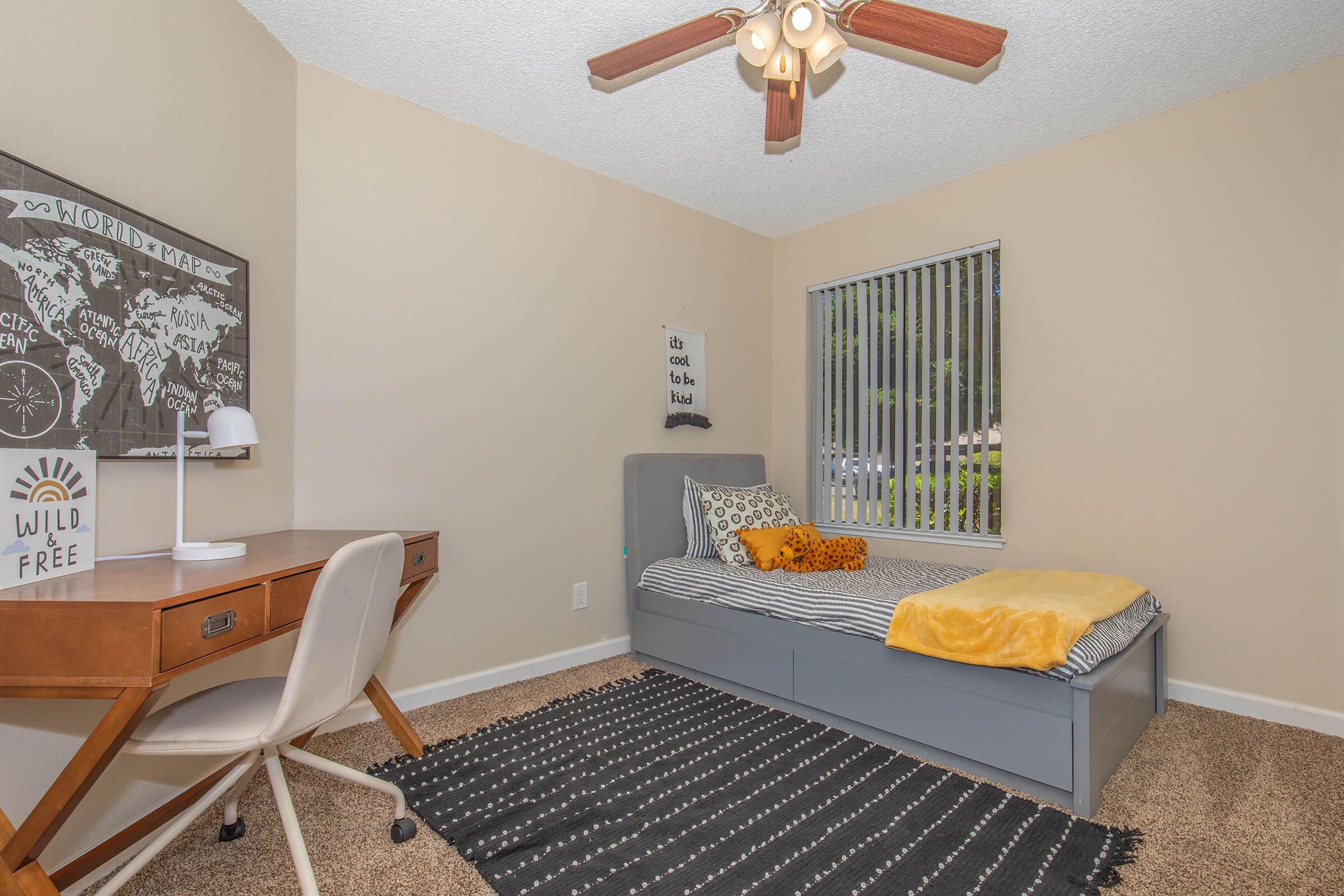 a living room filled with furniture and a table