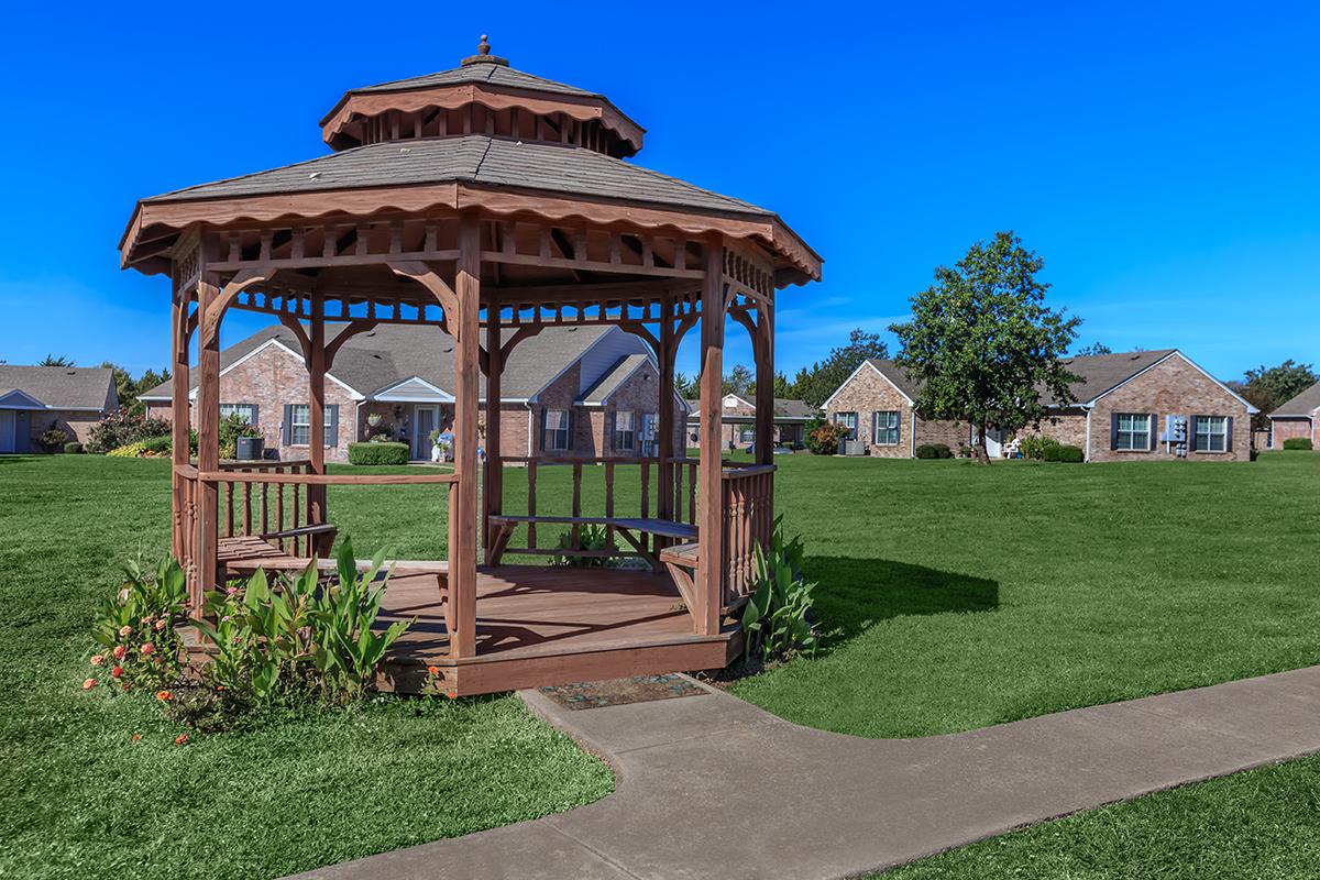 a large lawn in front of a building