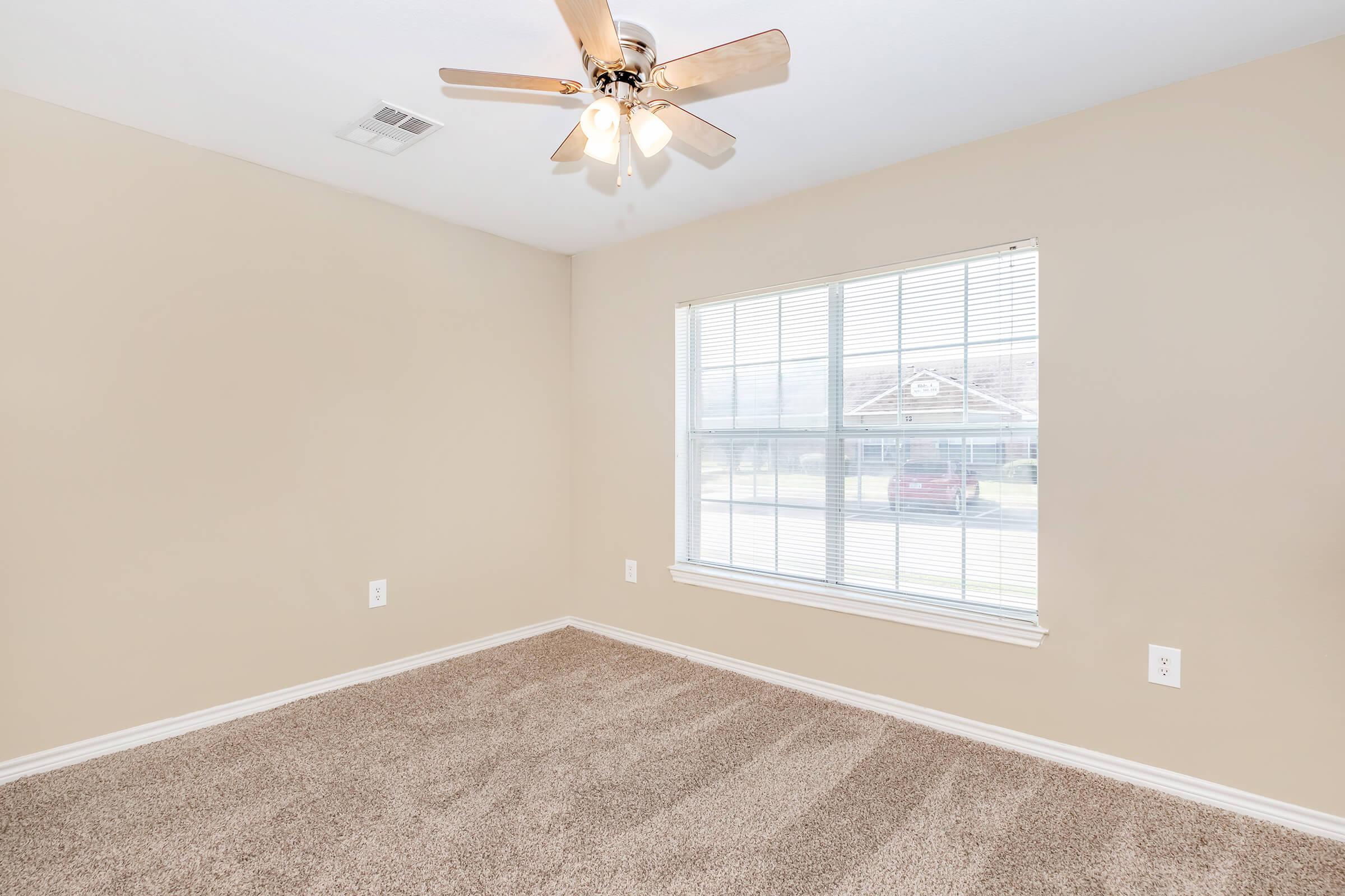 a room with a sink and a window