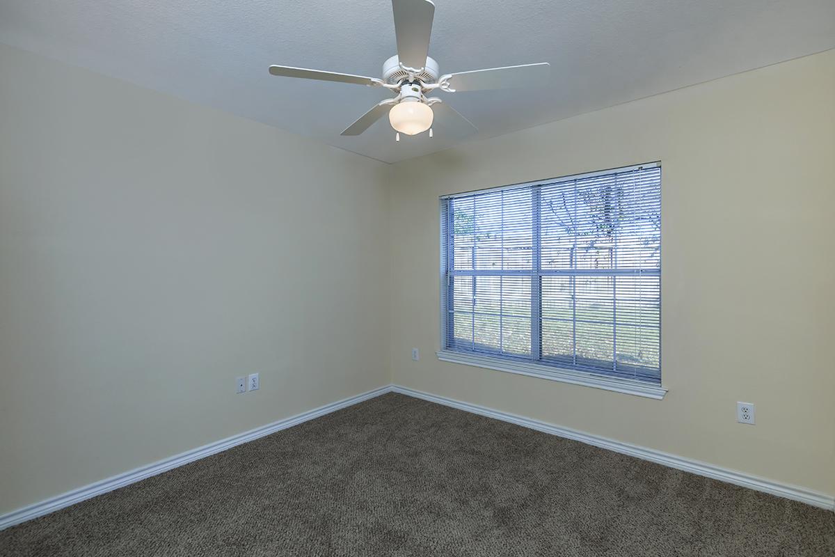 a room with a sink and a window