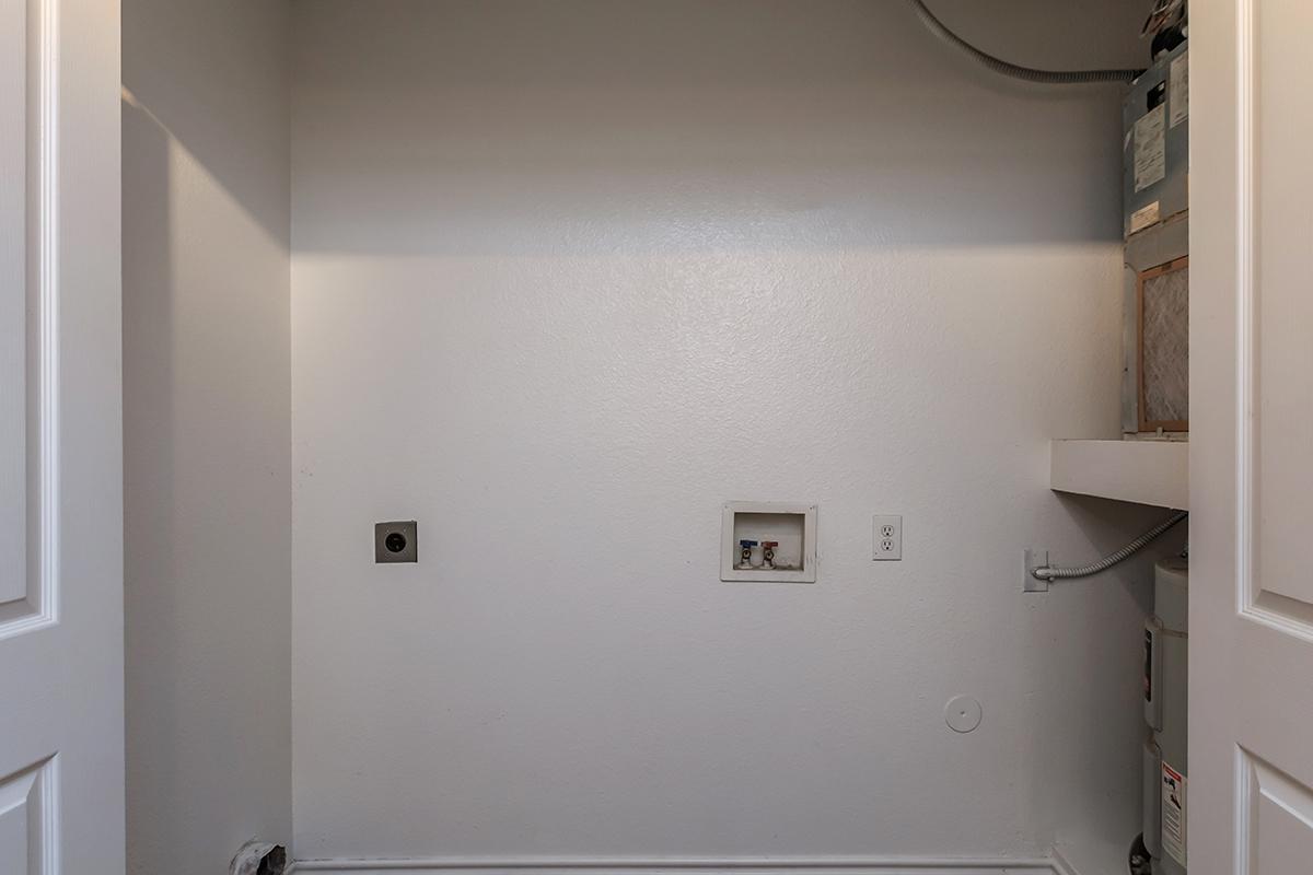 a white refrigerator freezer sitting in a room
