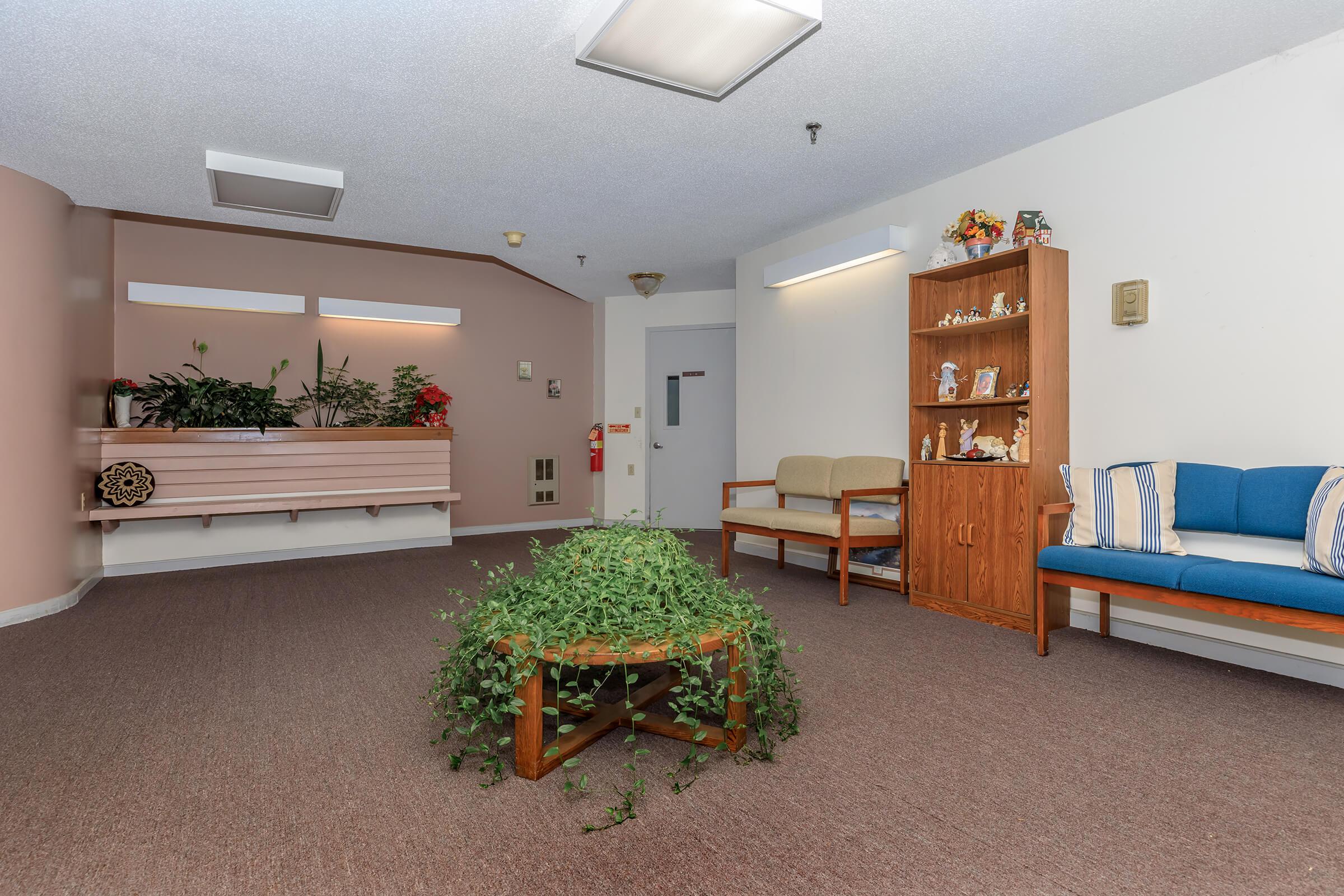 a living room filled with furniture and decor