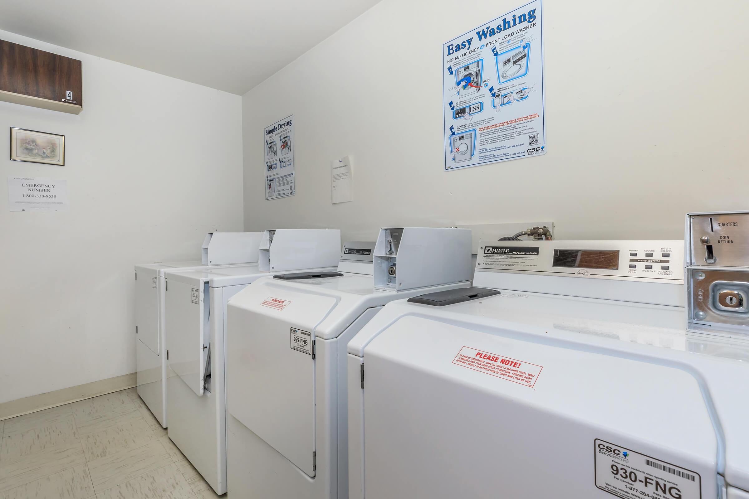 a white refrigerator freezer sitting in a room