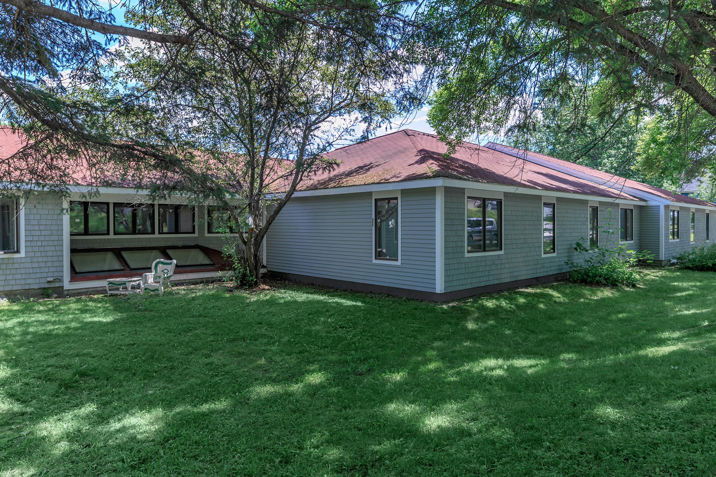 a large lawn in front of a house