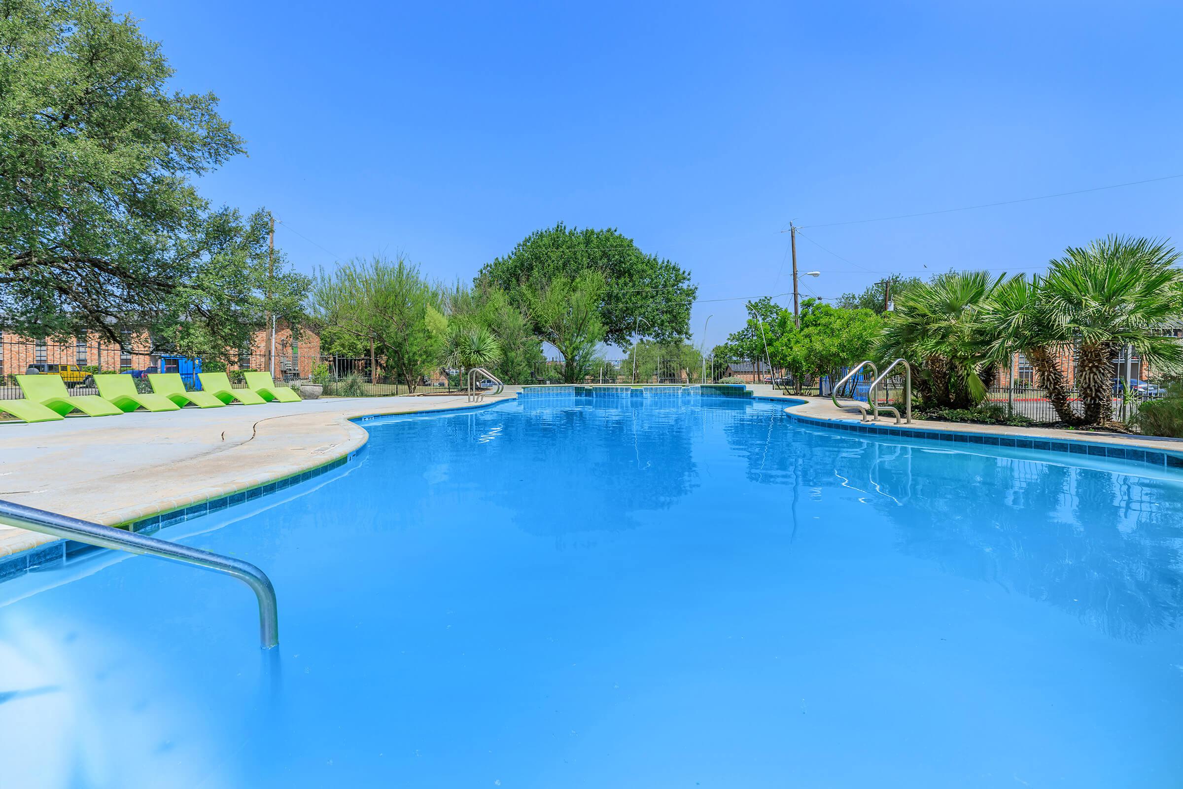 a pool next to a body of water