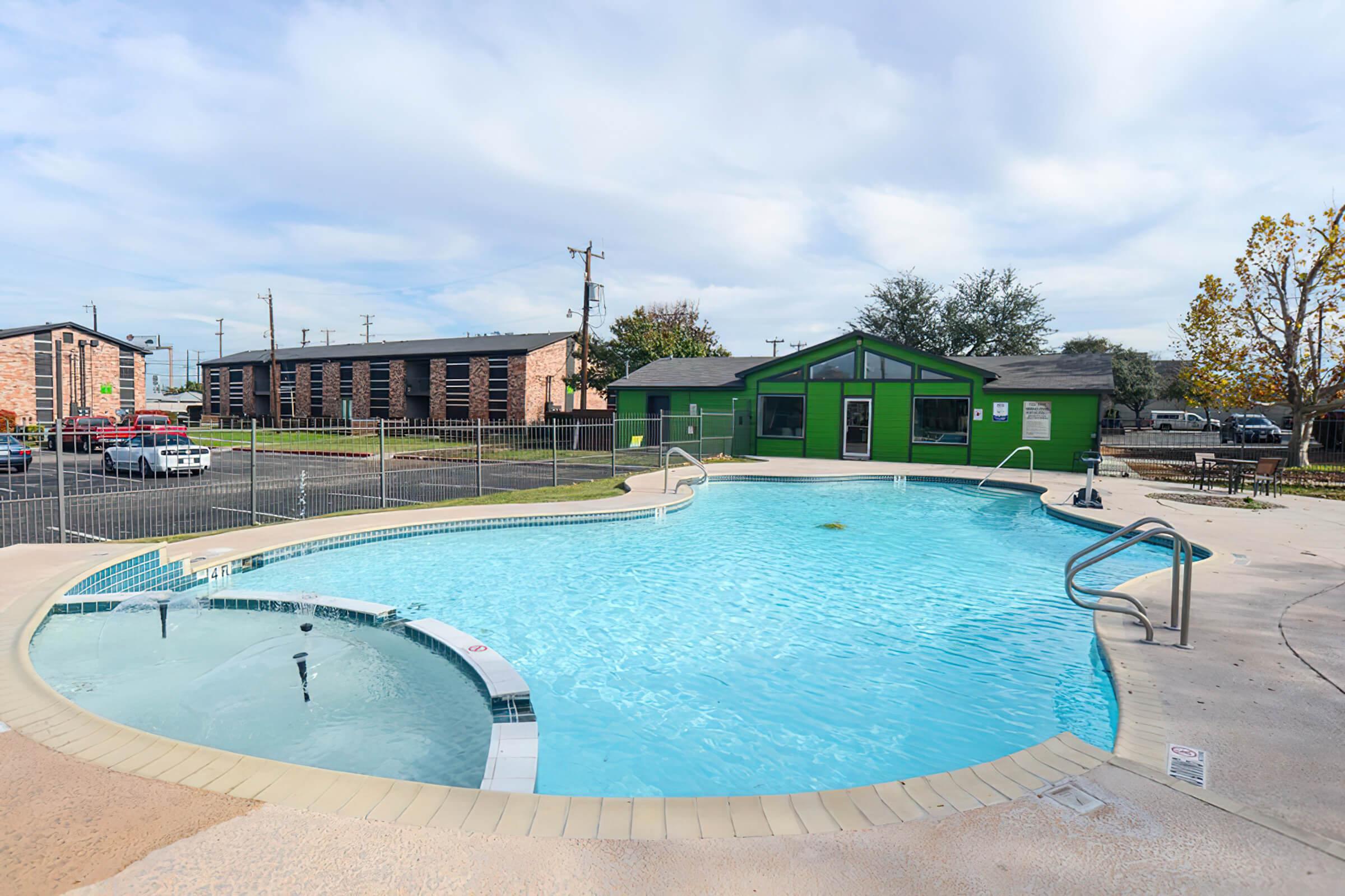 a pool next to a body of water