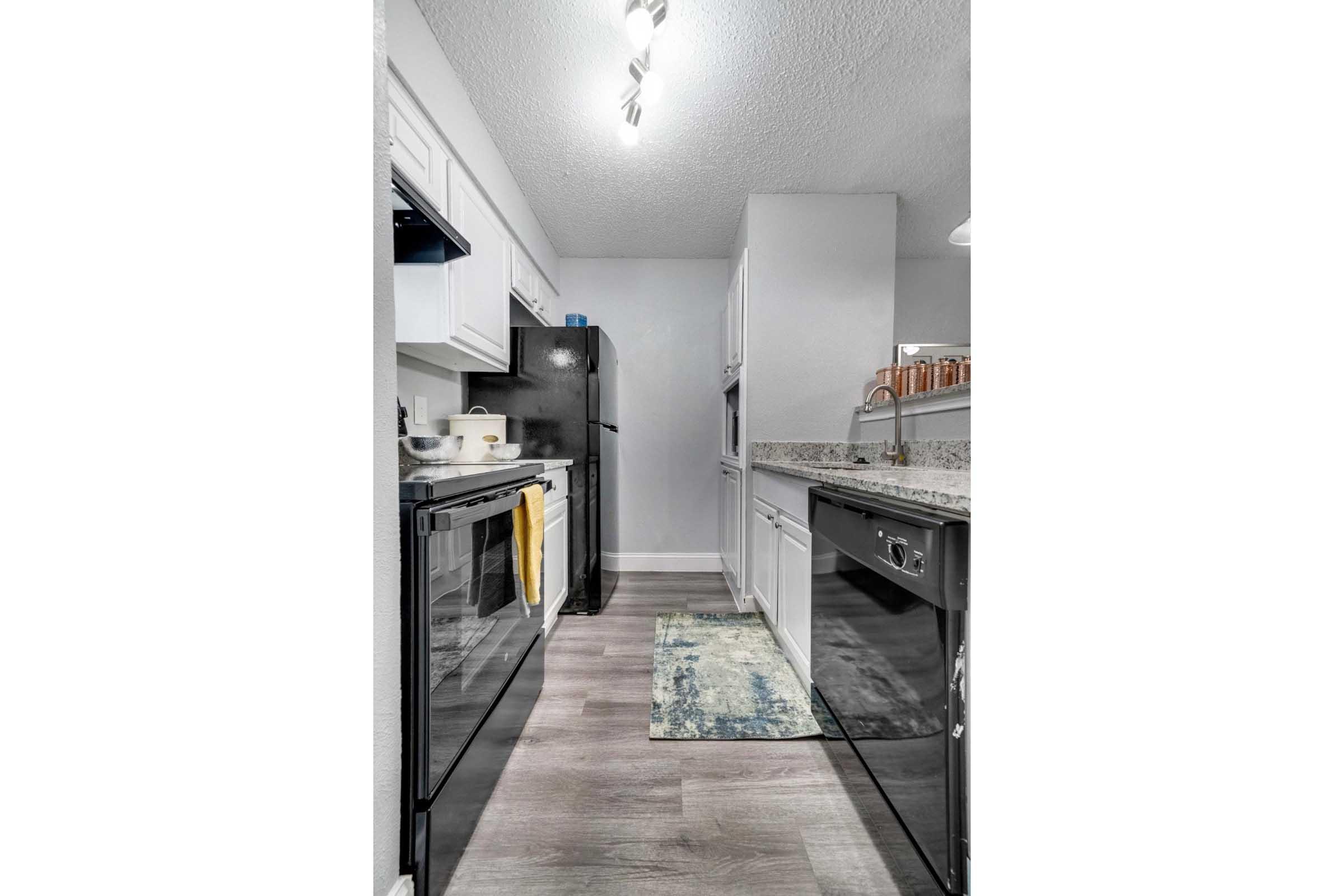 a stainless steel refrigerator in a kitchen